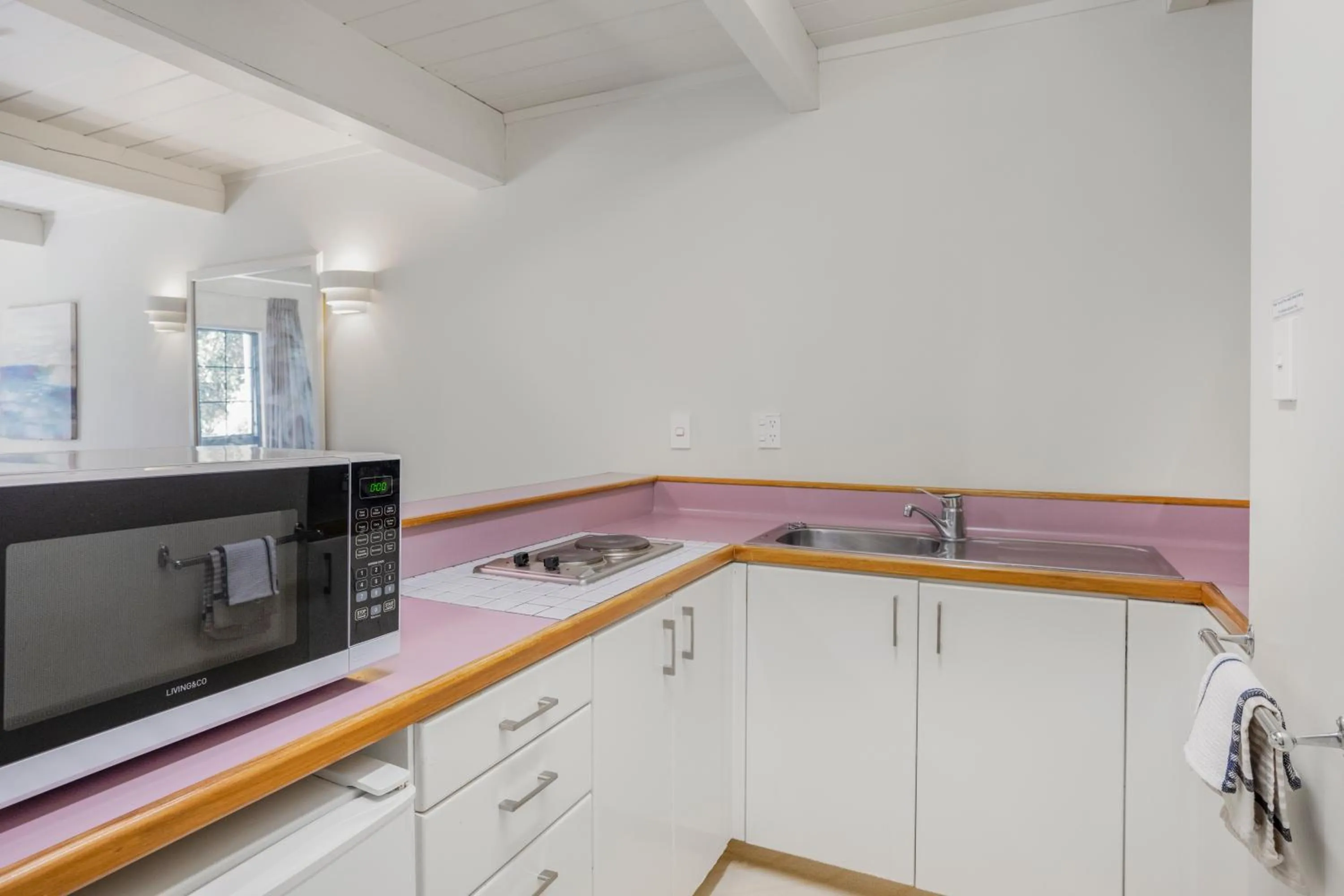 Kitchen or kitchenette in Capital Lodge Motor Inn