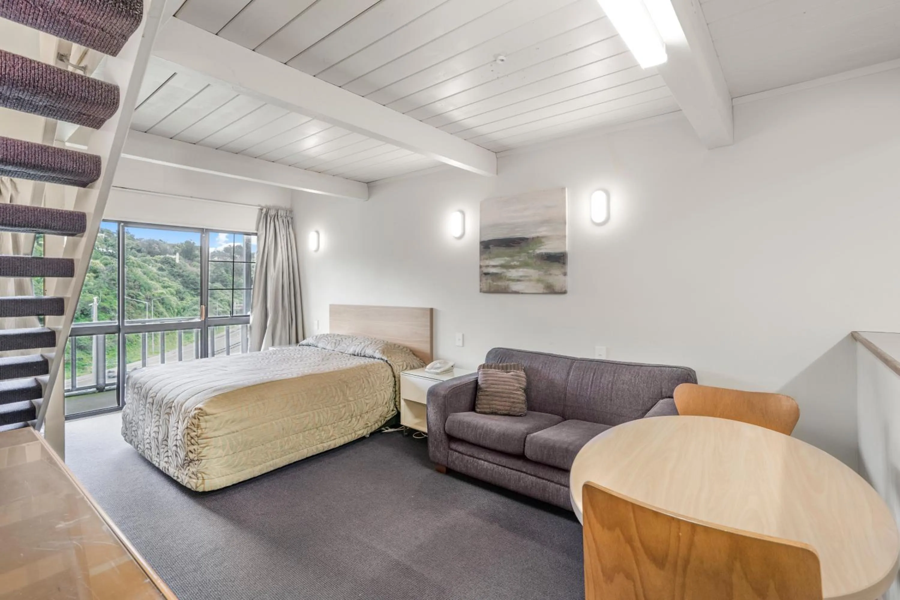 Bed in Capital Lodge Motor Inn