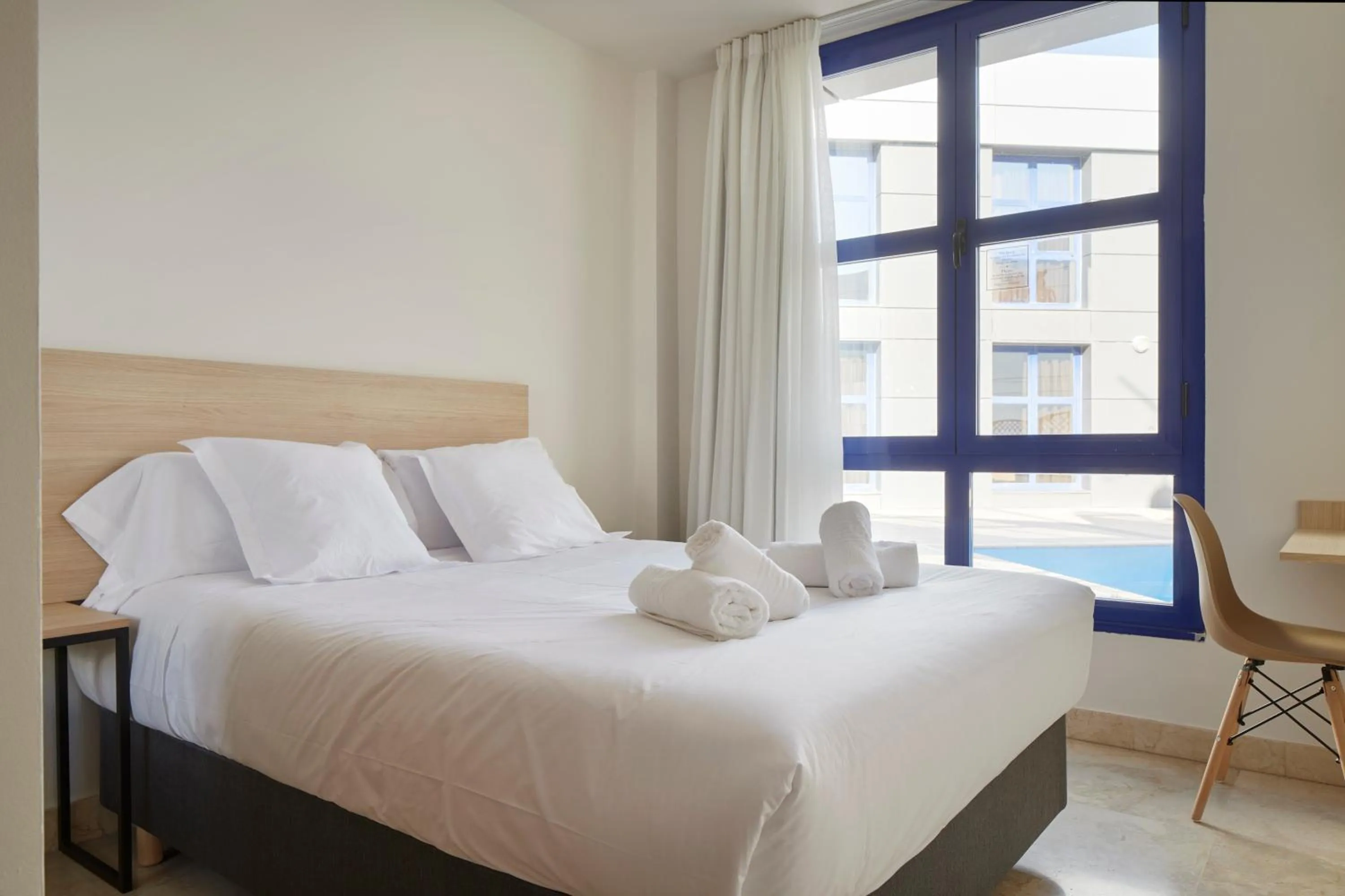 Photo of the whole room, Bed in Iraipe Logroño Hotel