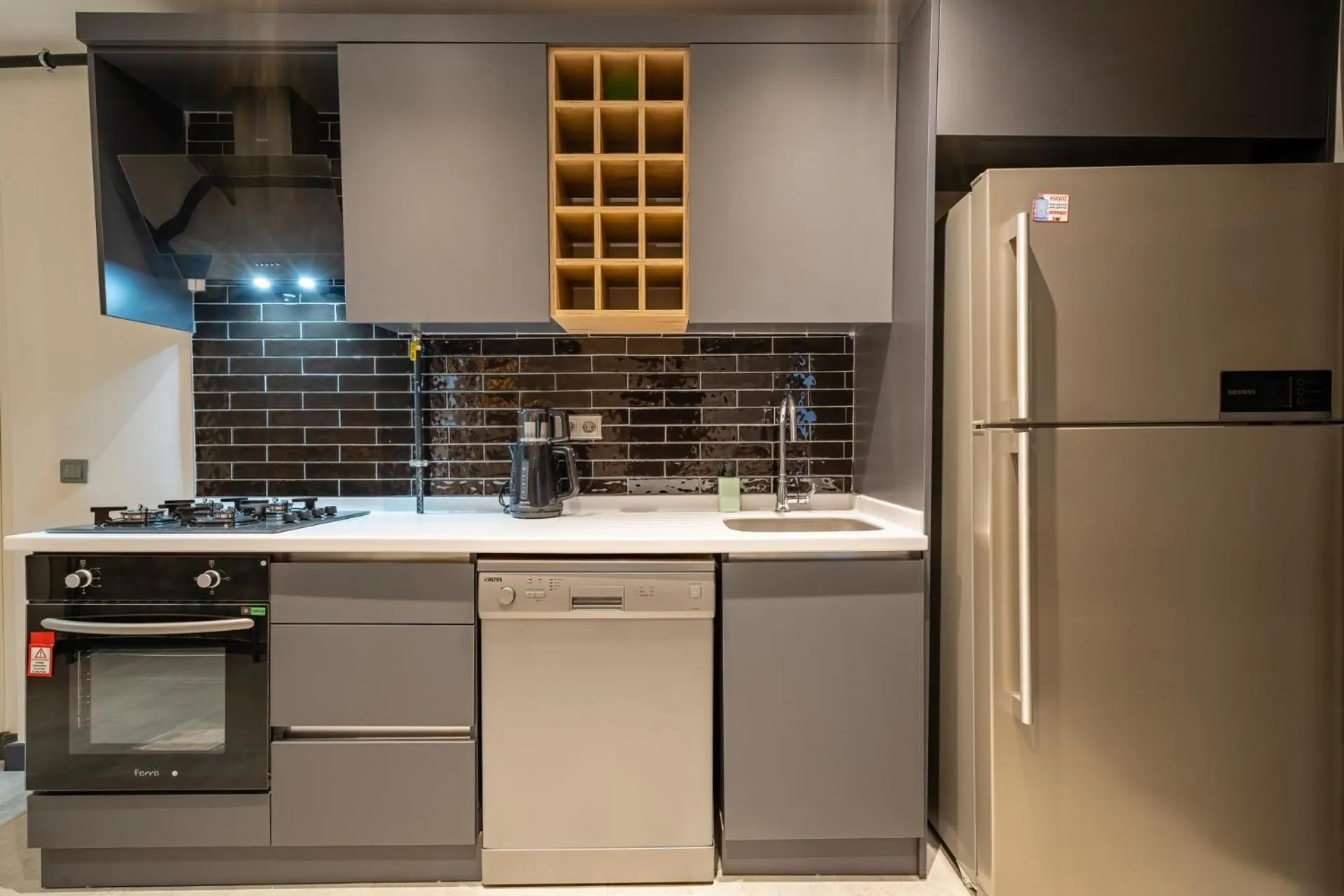 Kitchen or kitchenette in ELUXİO SUİTE HOTEL