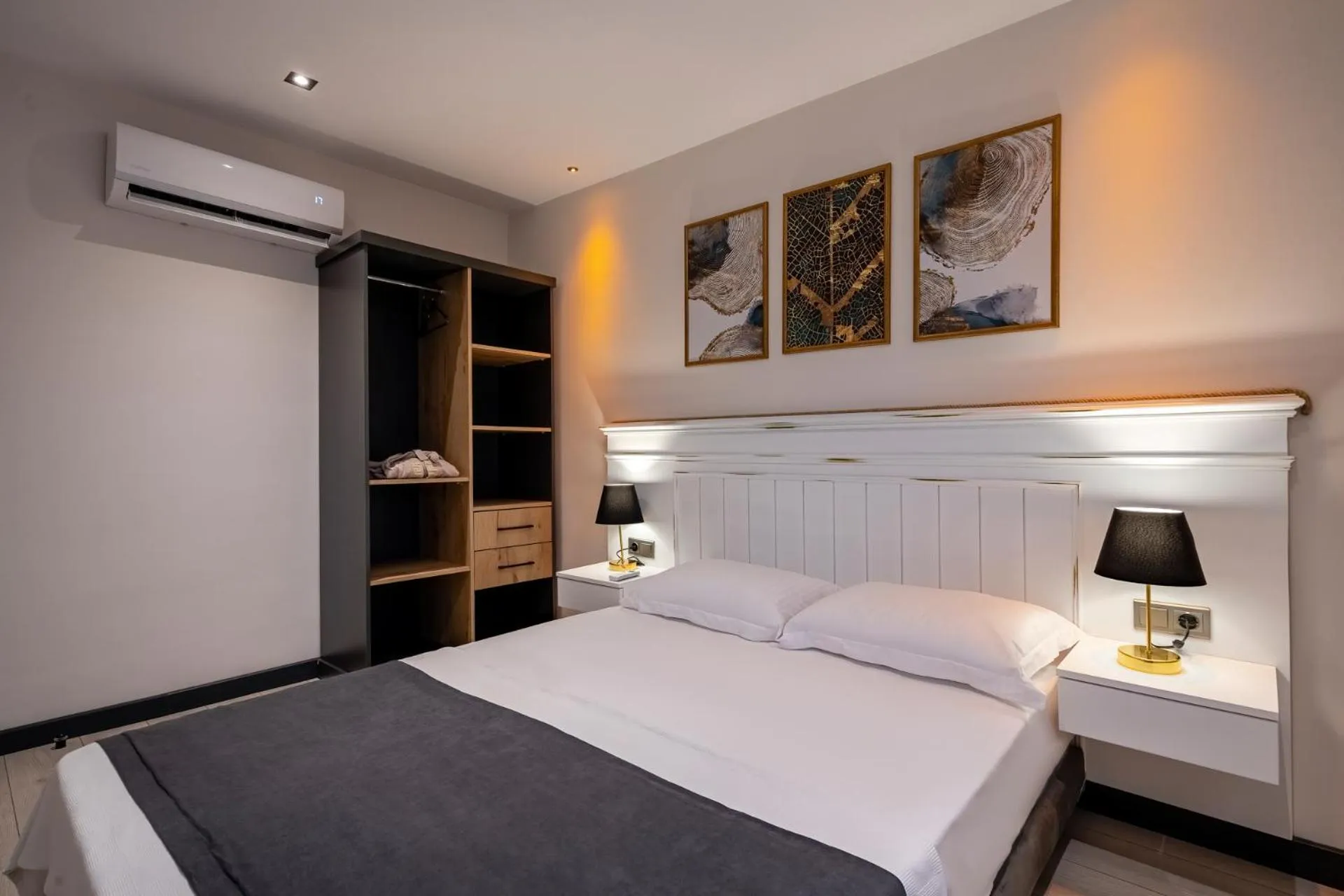 Bed in ELUXİO SUİTE HOTEL