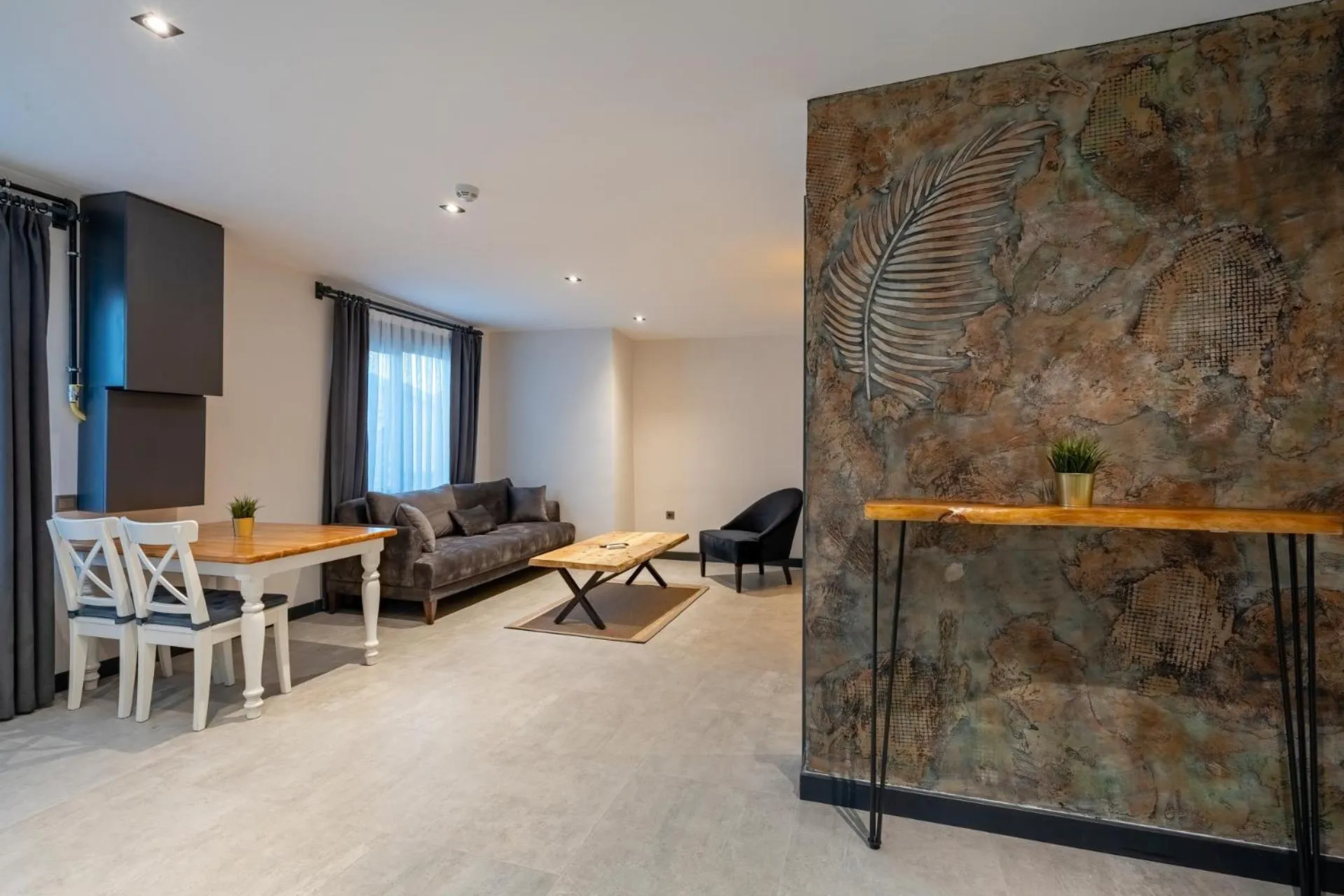 Seating area in ELUXİO SUİTE HOTEL