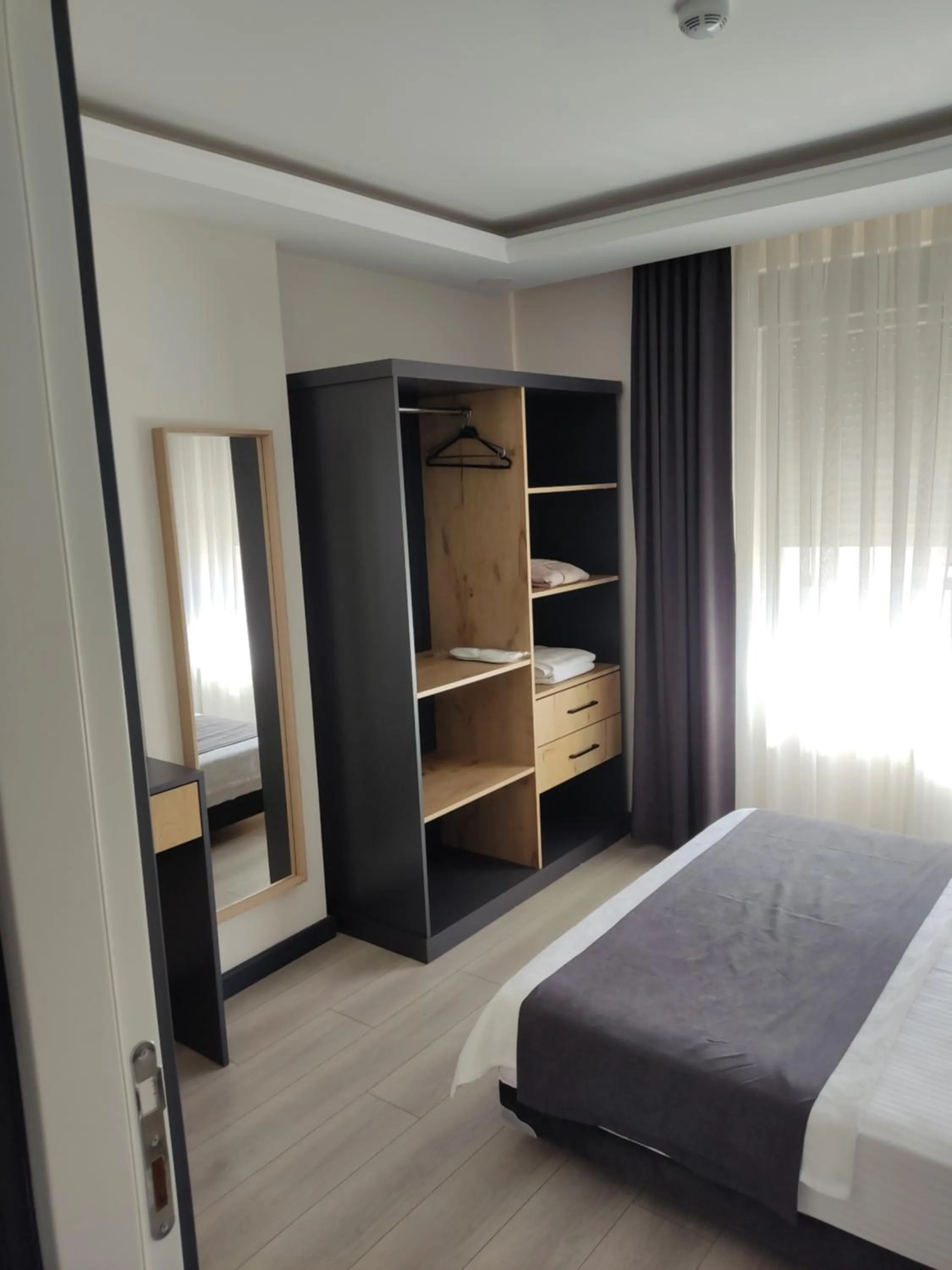 wardrobe in ELUXİO SUİTE HOTEL