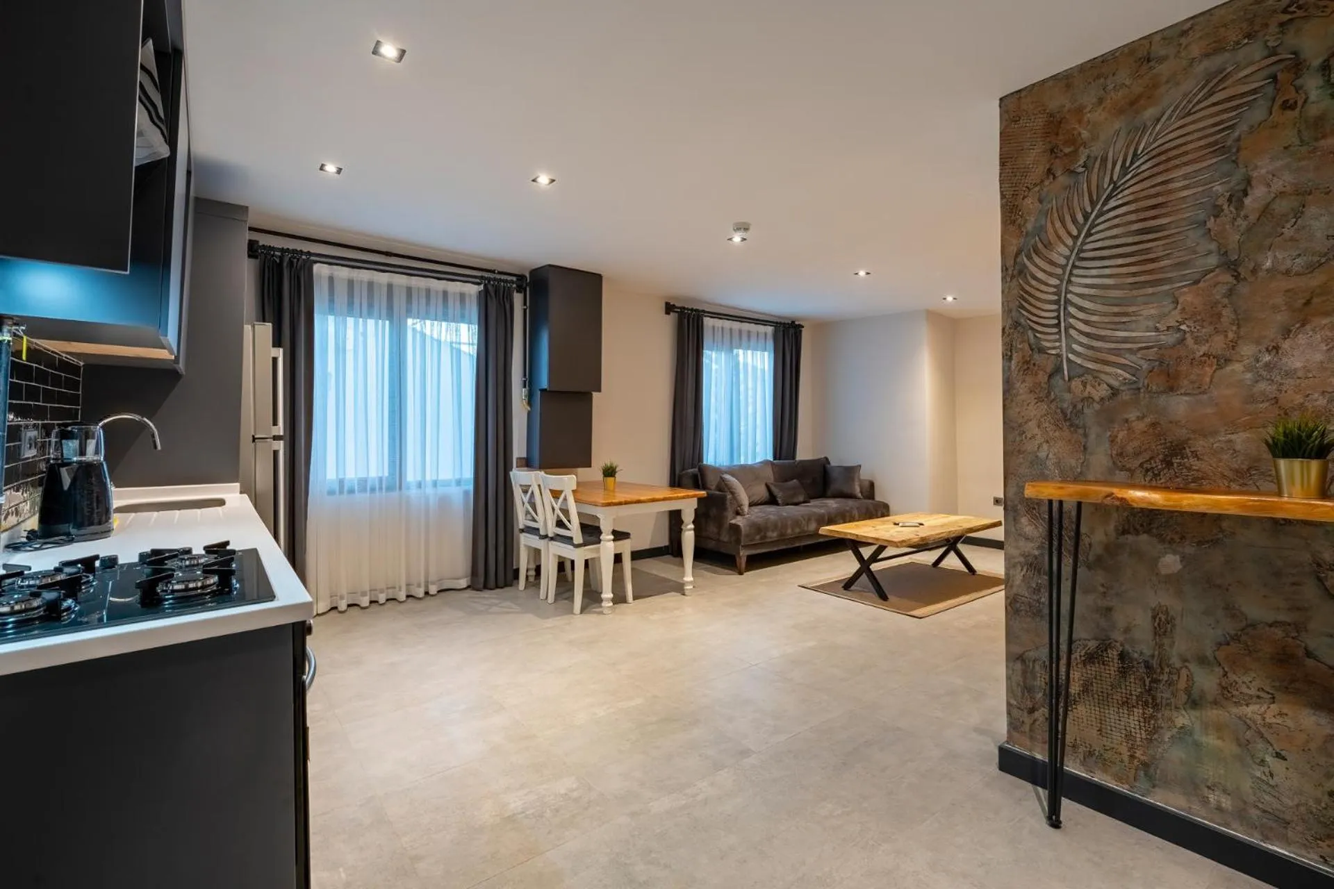 Kitchen or kitchenette in ELUXİO SUİTE HOTEL