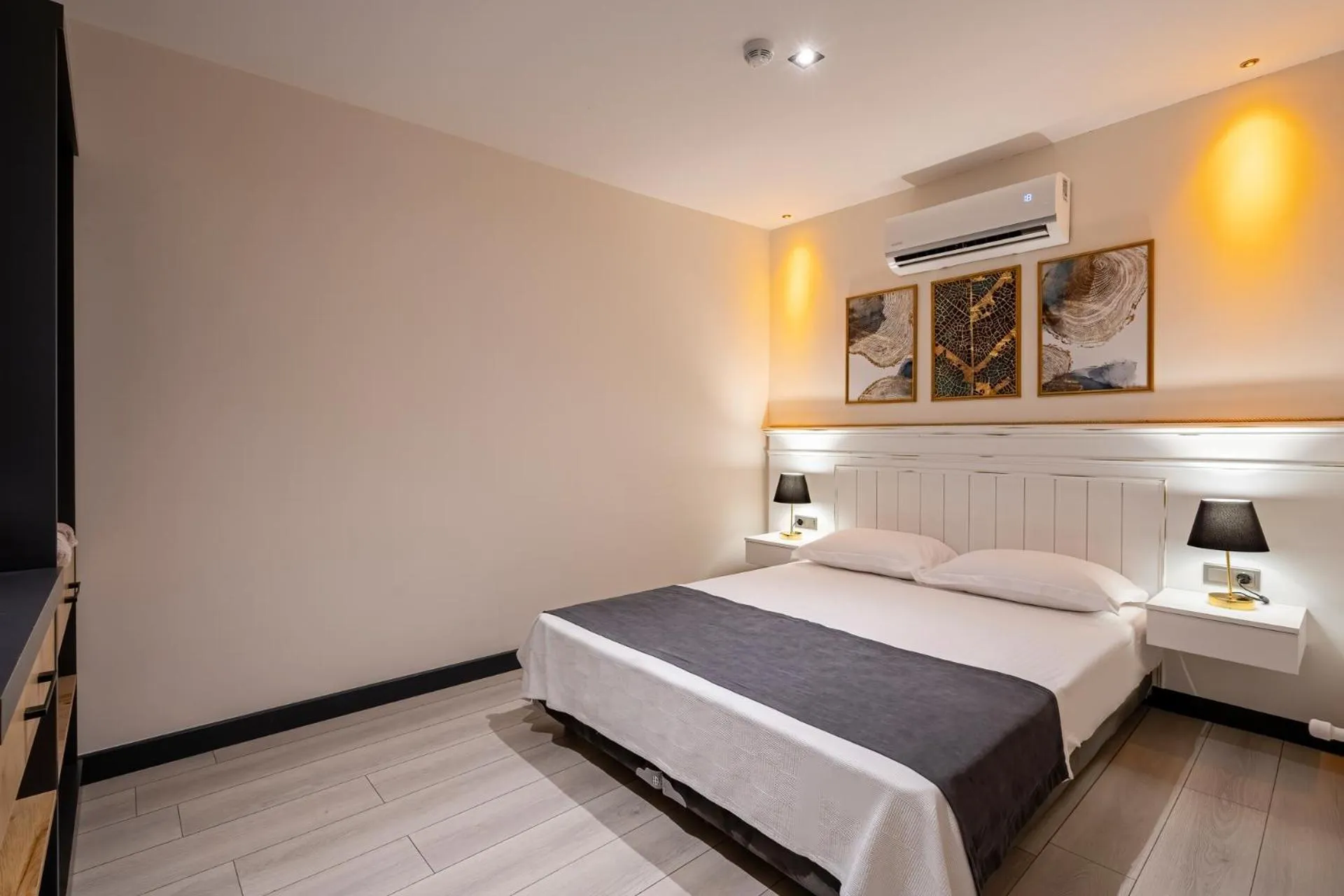 Bed in ELUXİO SUİTE HOTEL