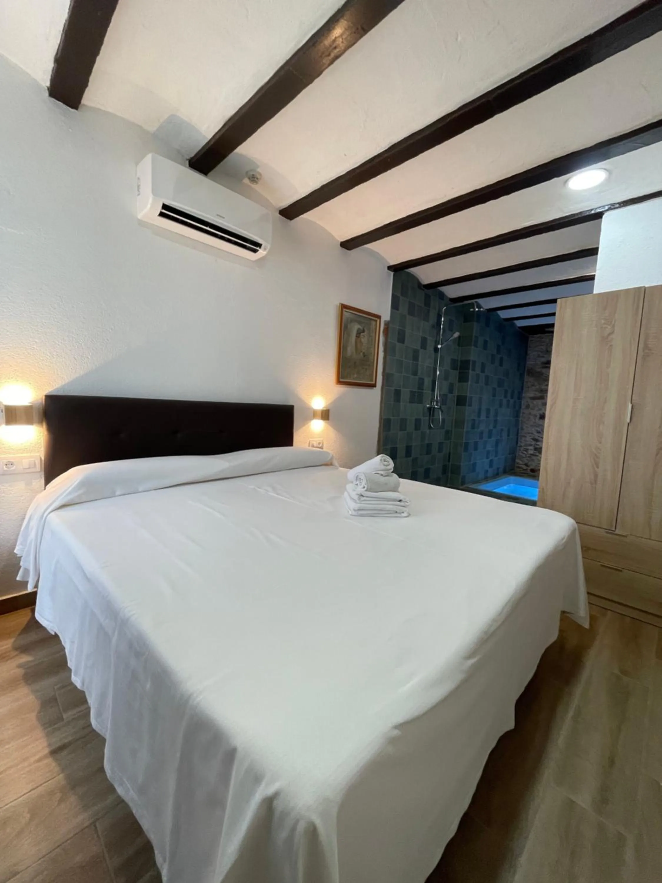 Bed in Hotel Mas Palou