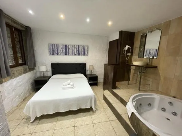 Bed in Hotel Mas Palou