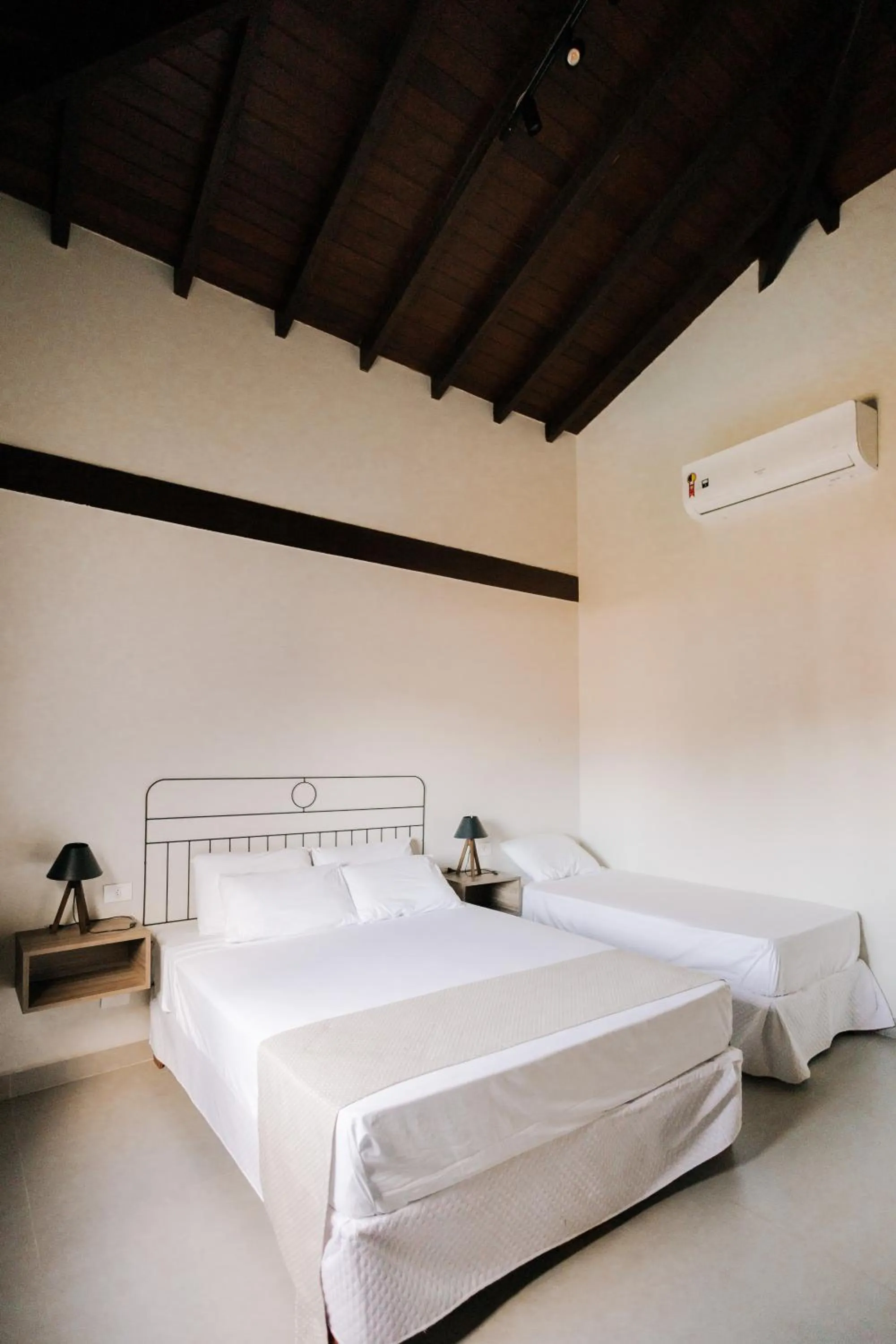 Bed in Pousada Zama