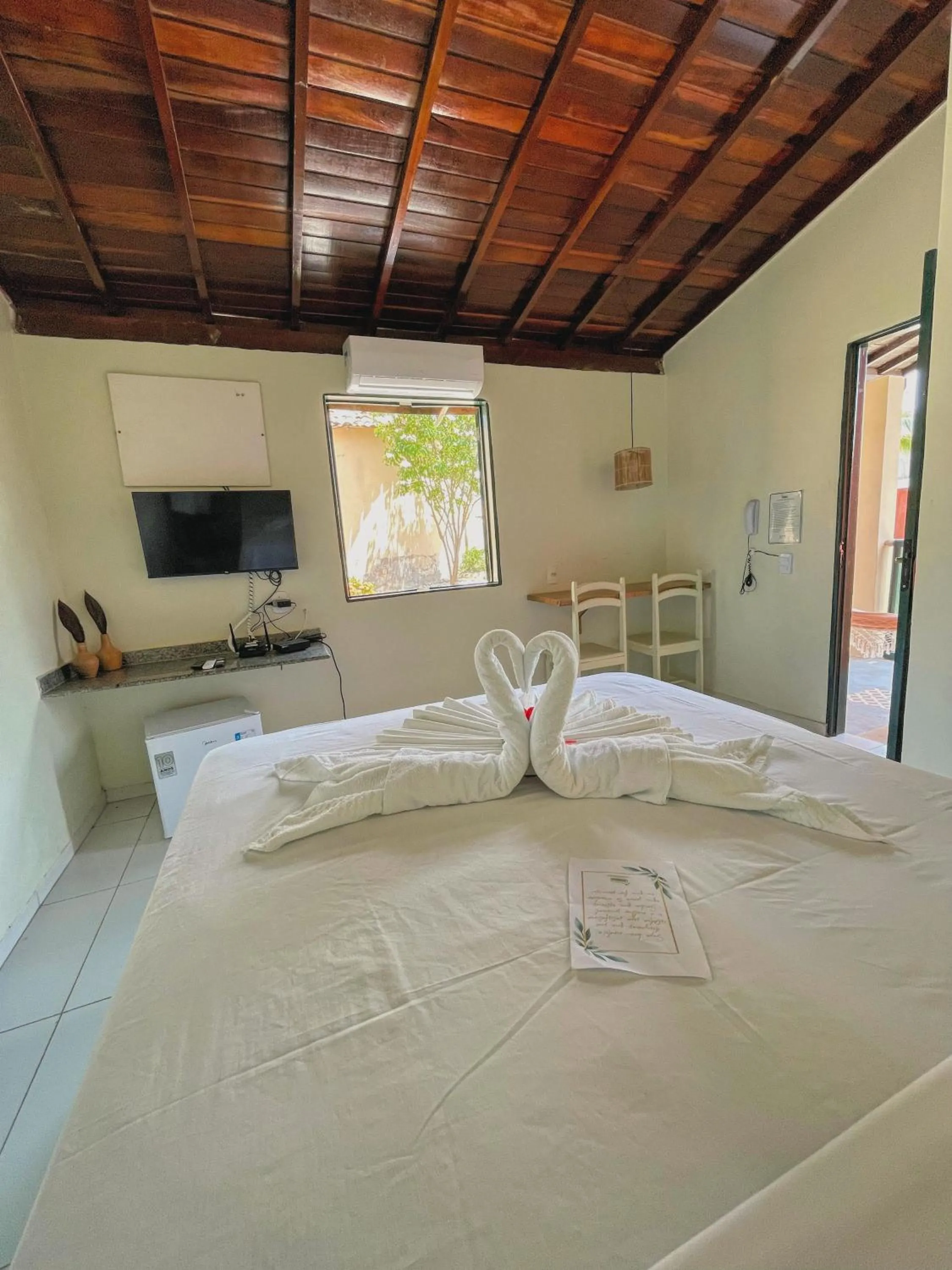 TV and multimedia, Bed in Pousada Paradise