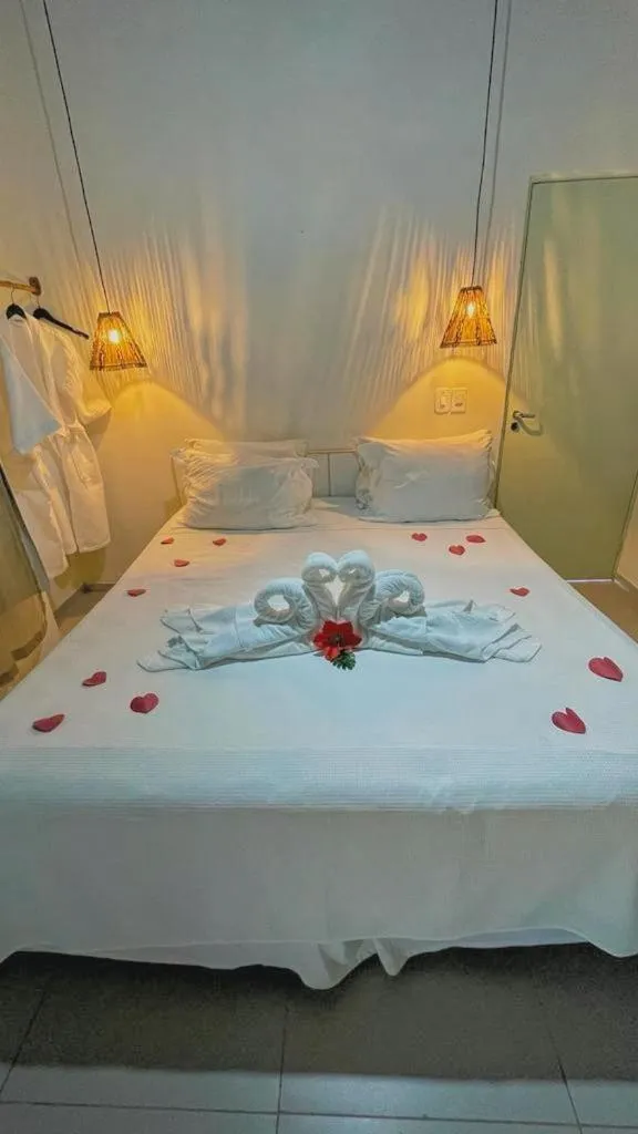 Bed in Pousada Paradise