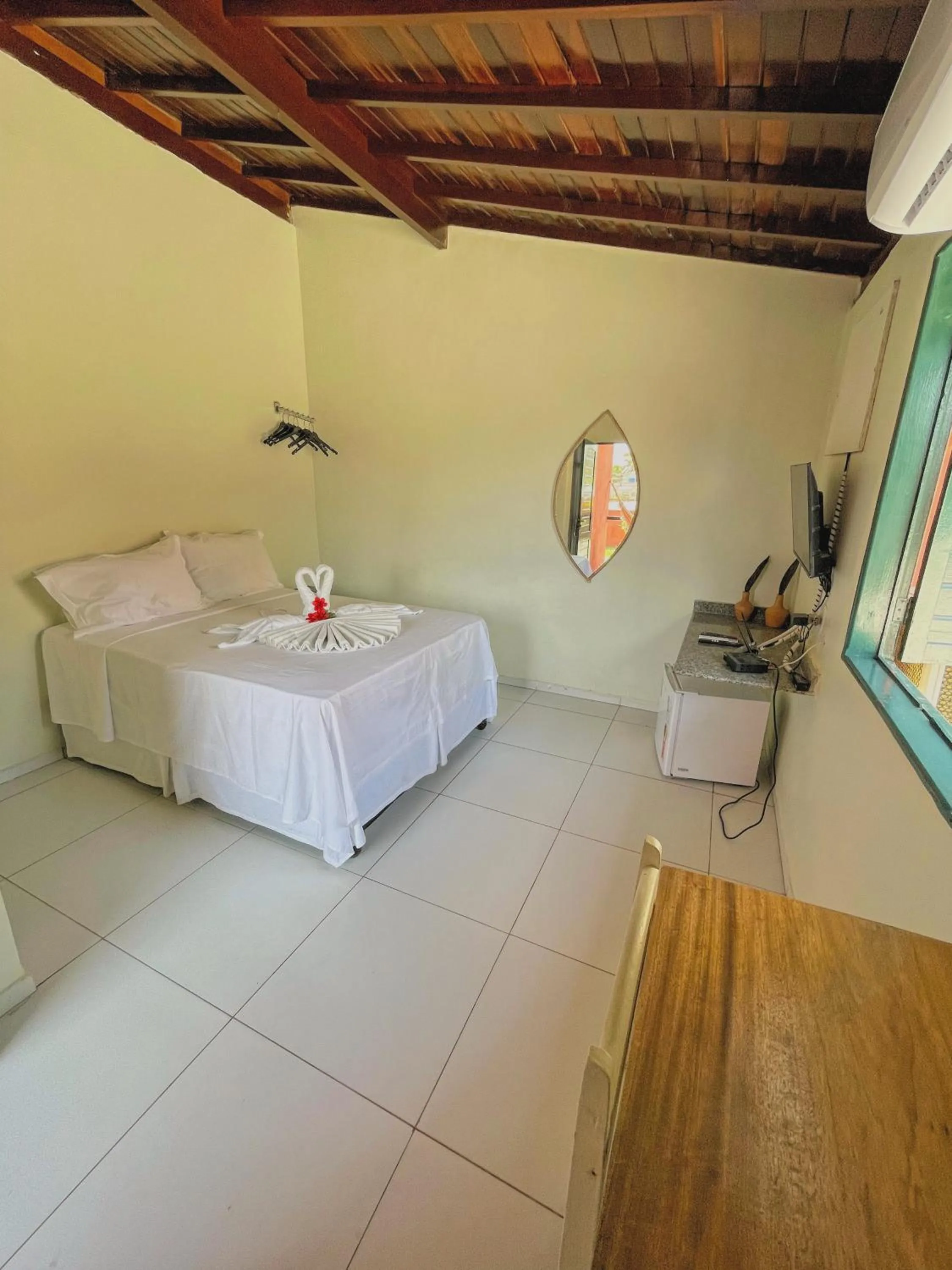 Bed in Pousada Paradise