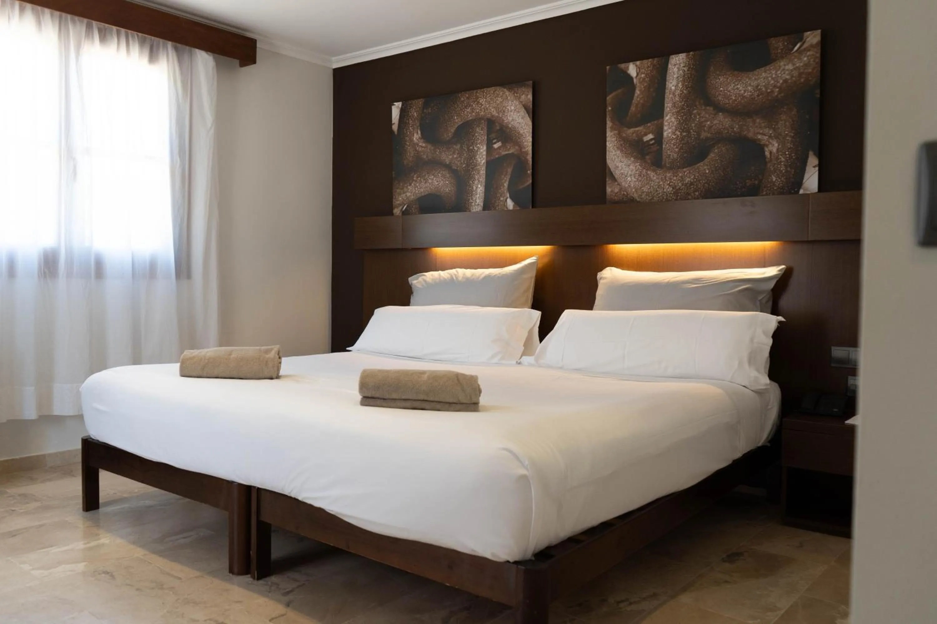 Bed in Maristel Hotel & Spa - Adults Only