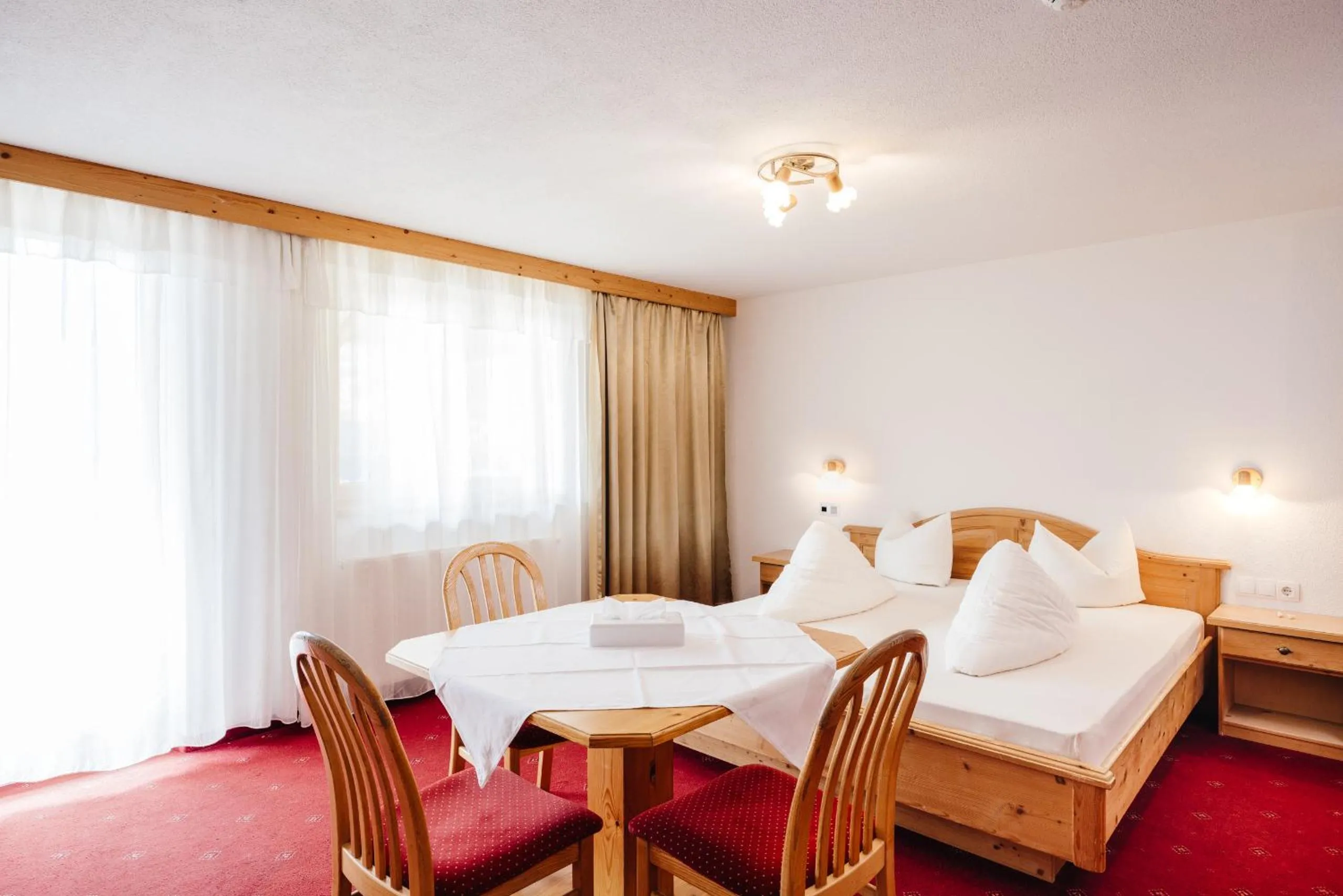 Living room, Bed in Hotel Andrea
