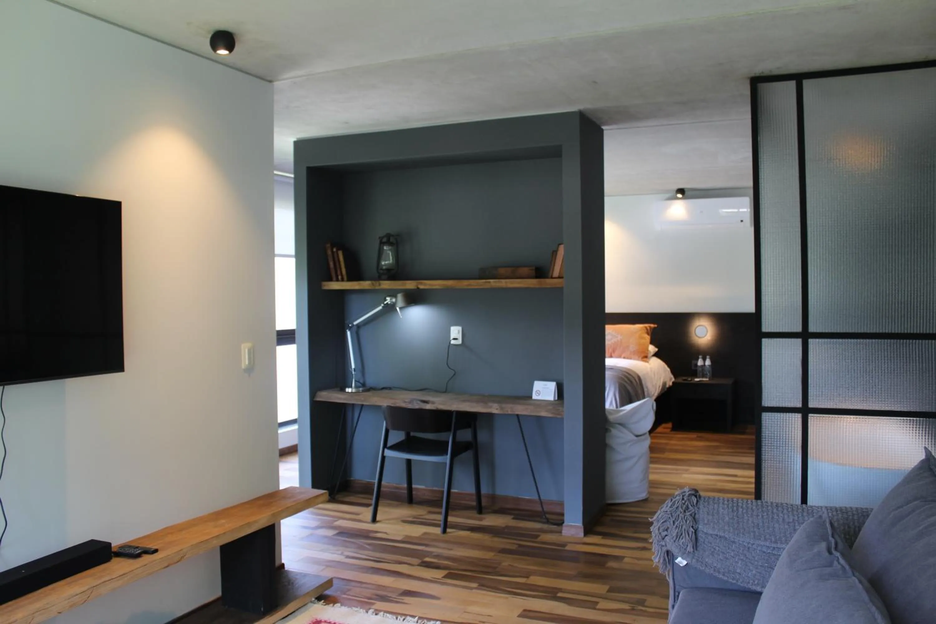 Living room, Bed in Be House Suites & Spa