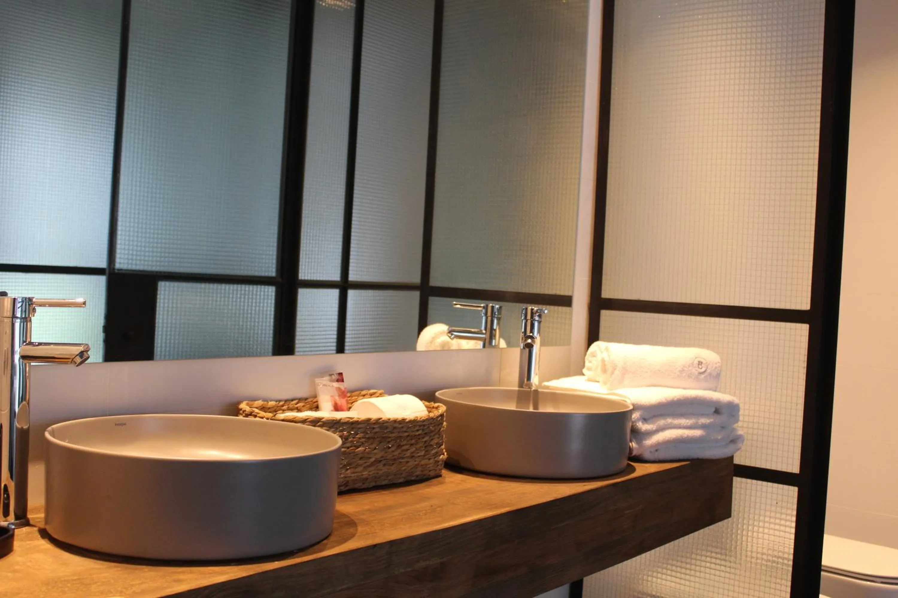 Bathroom in Be House Suites & Spa