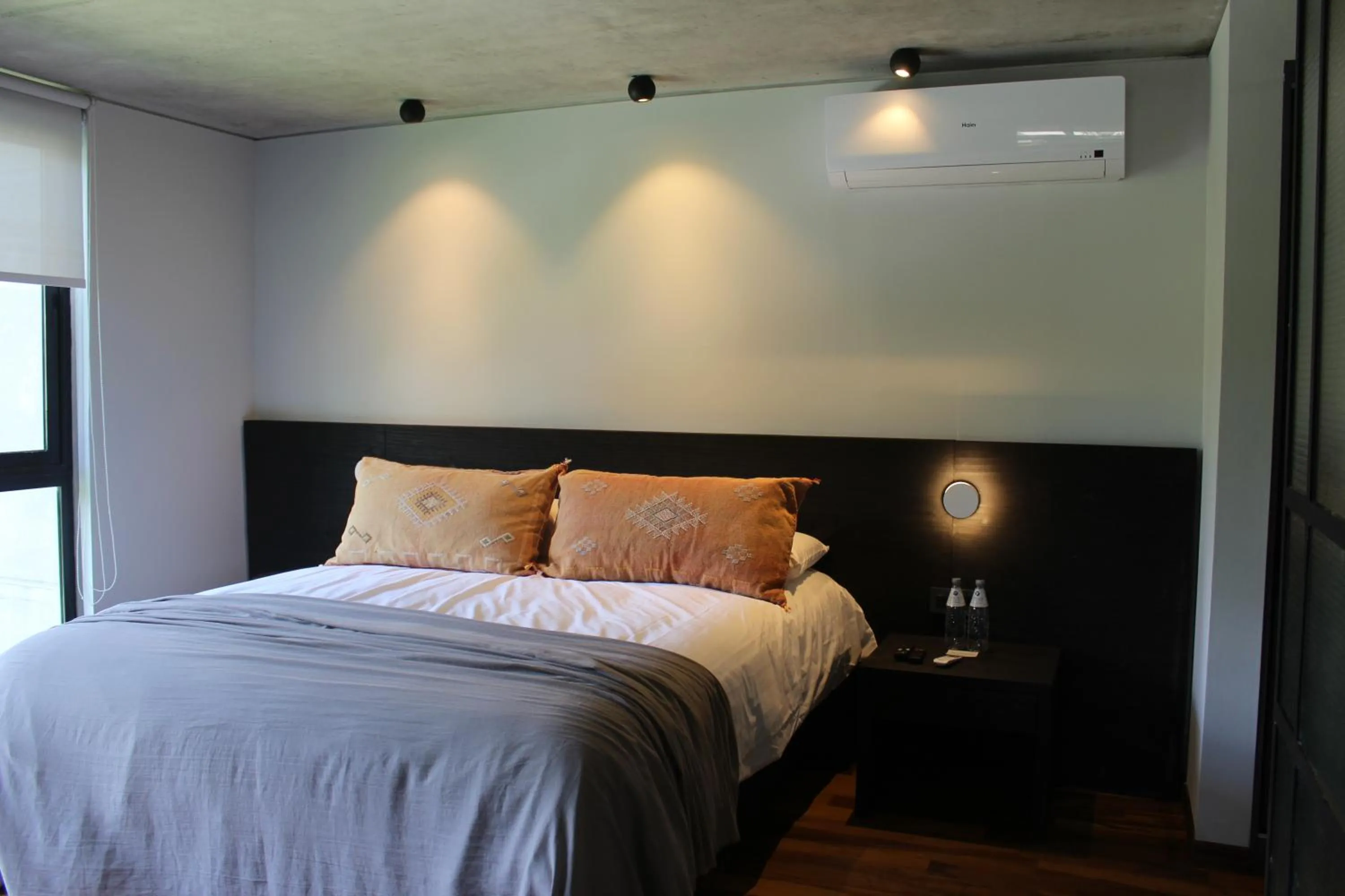 Bed in Be House Suites & Spa