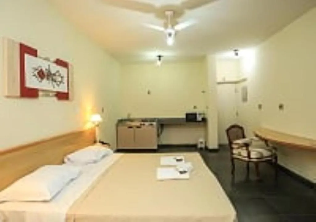 Bed in Bravo Suites São Carlos