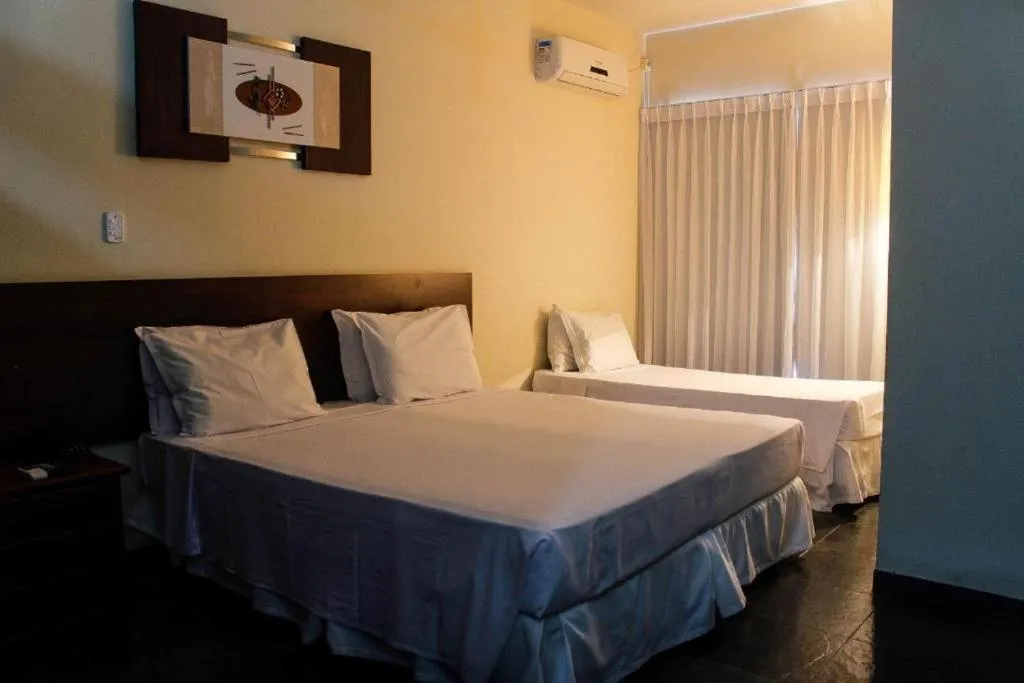 Bed in Bravo Suites São Carlos