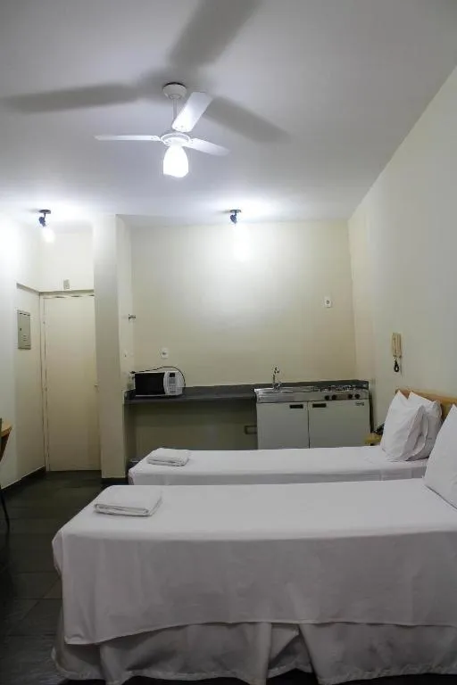 Bed in Bravo Suites São Carlos