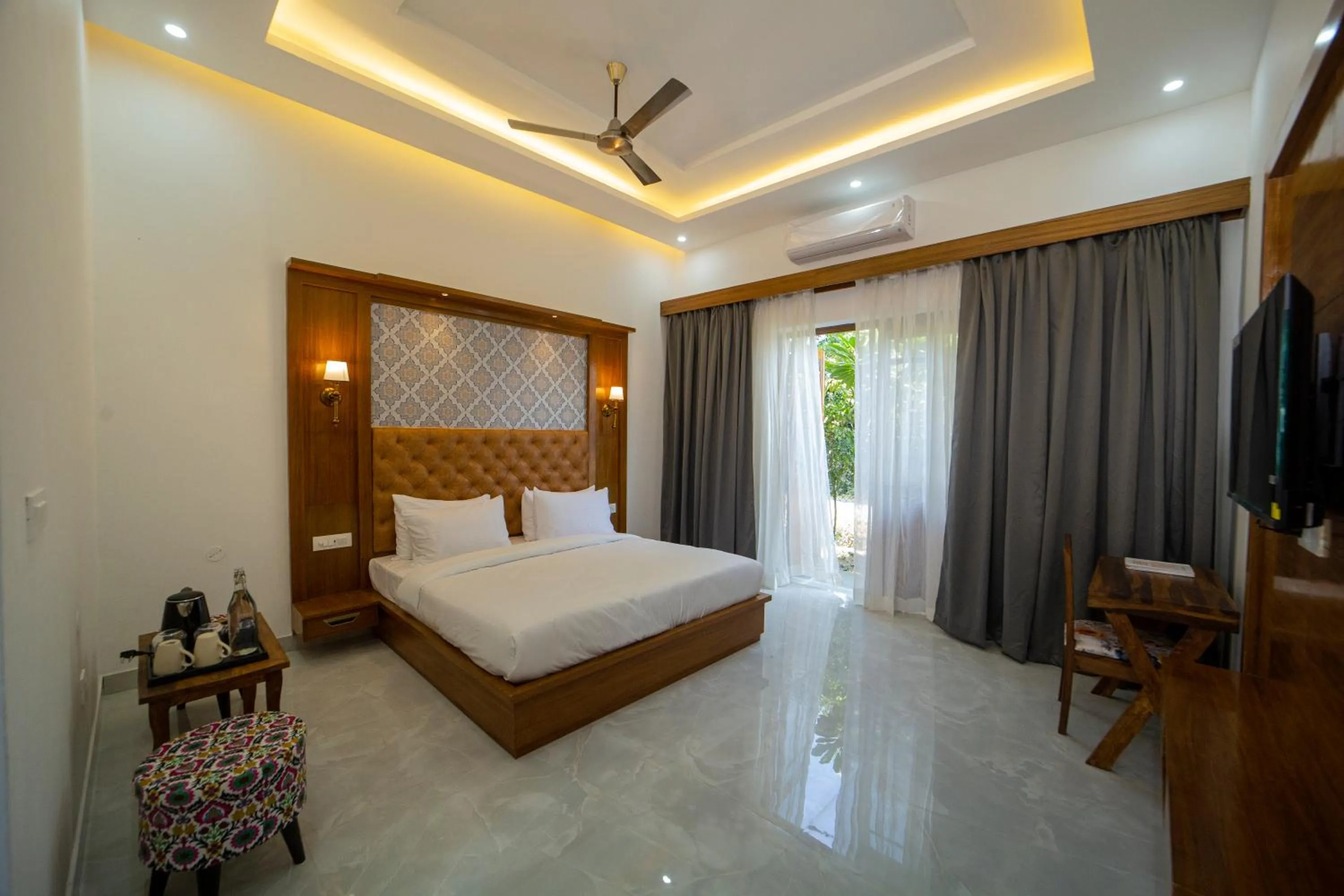 Photo of the whole room, Bed in Yellow Tail by Puggles Resorts