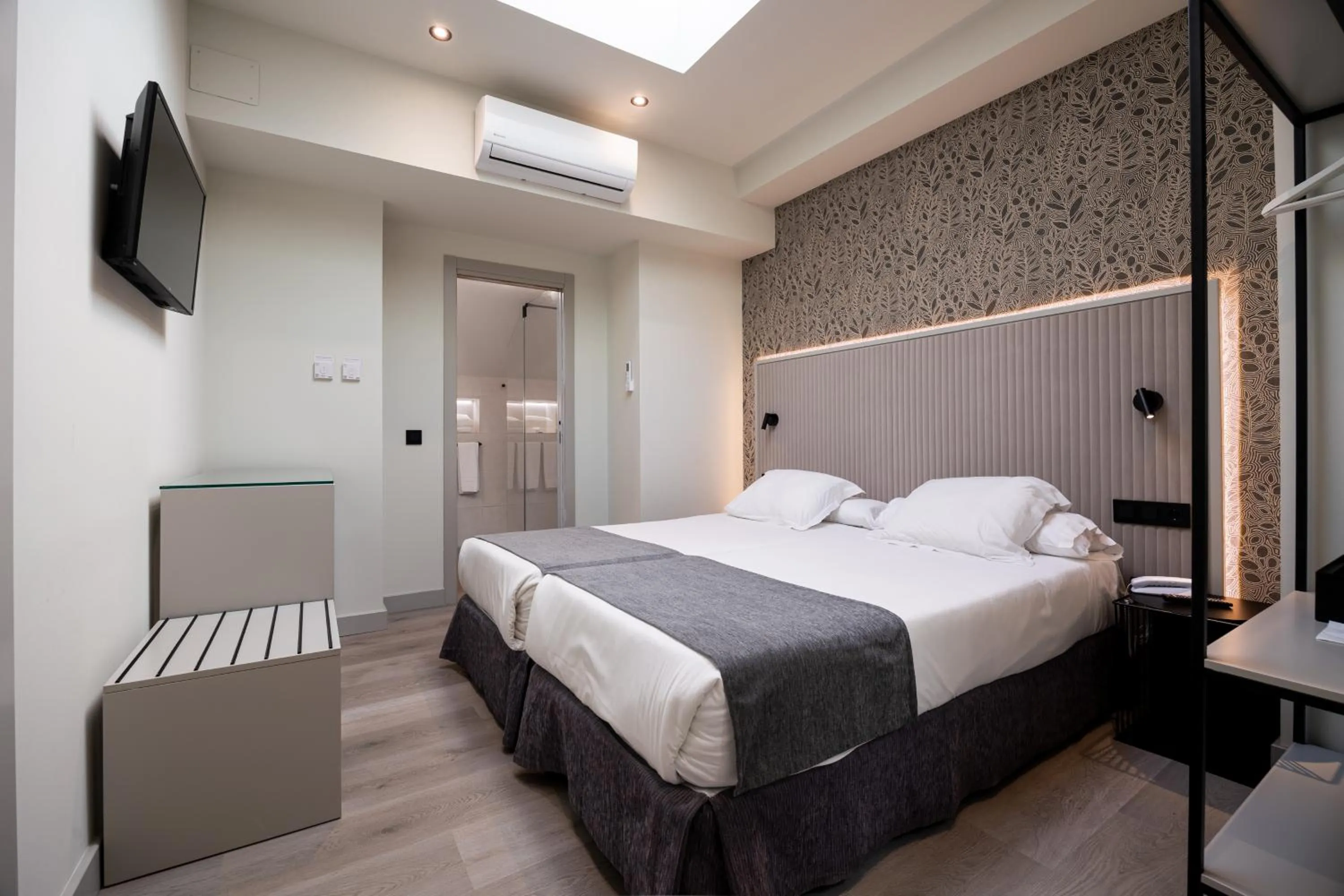 Bed in Atarazanas Málaga Boutique Hotel