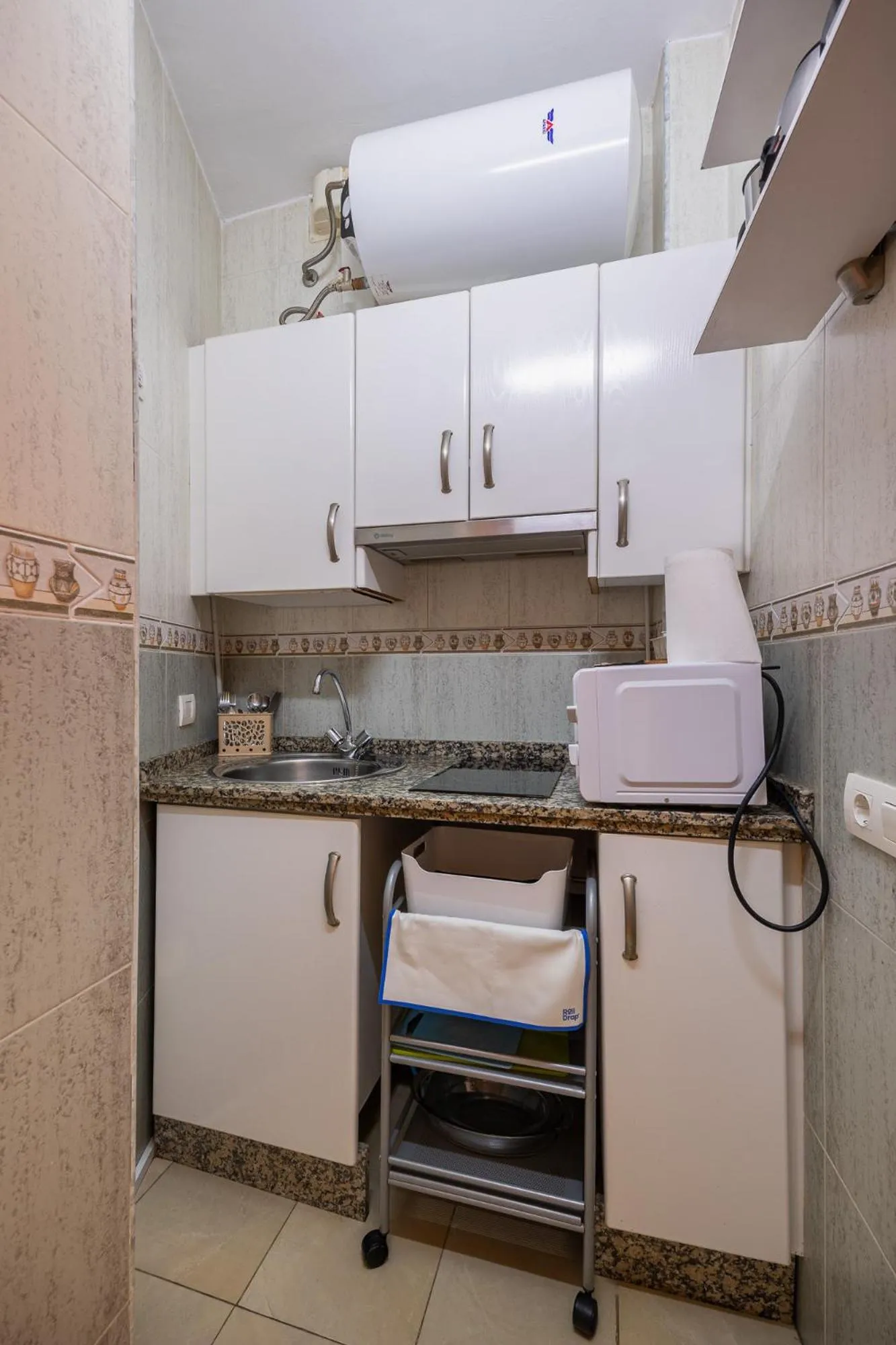 Kitchen or kitchenette in Atarazanas Málaga Boutique Hotel