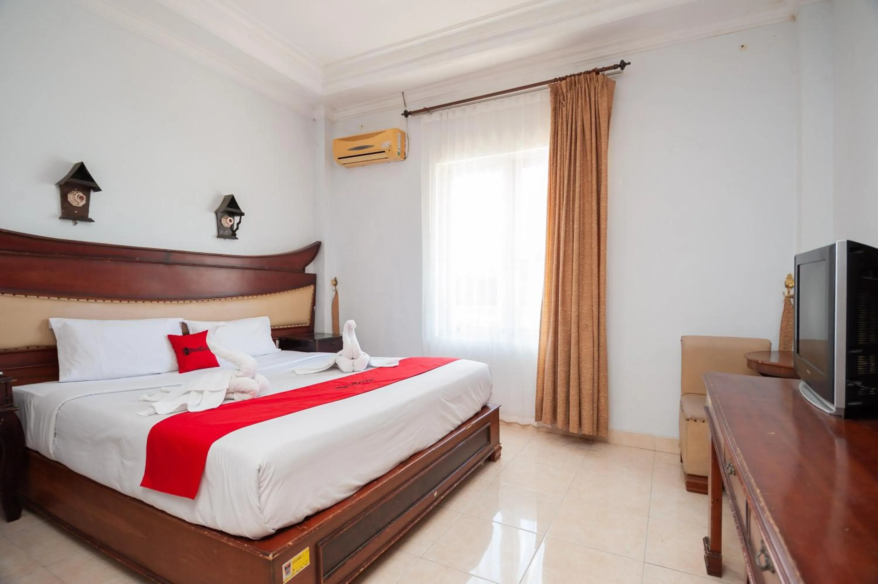 Bedroom, Bed in RedDoorz Syariah near RS Yos Sudarso Padang