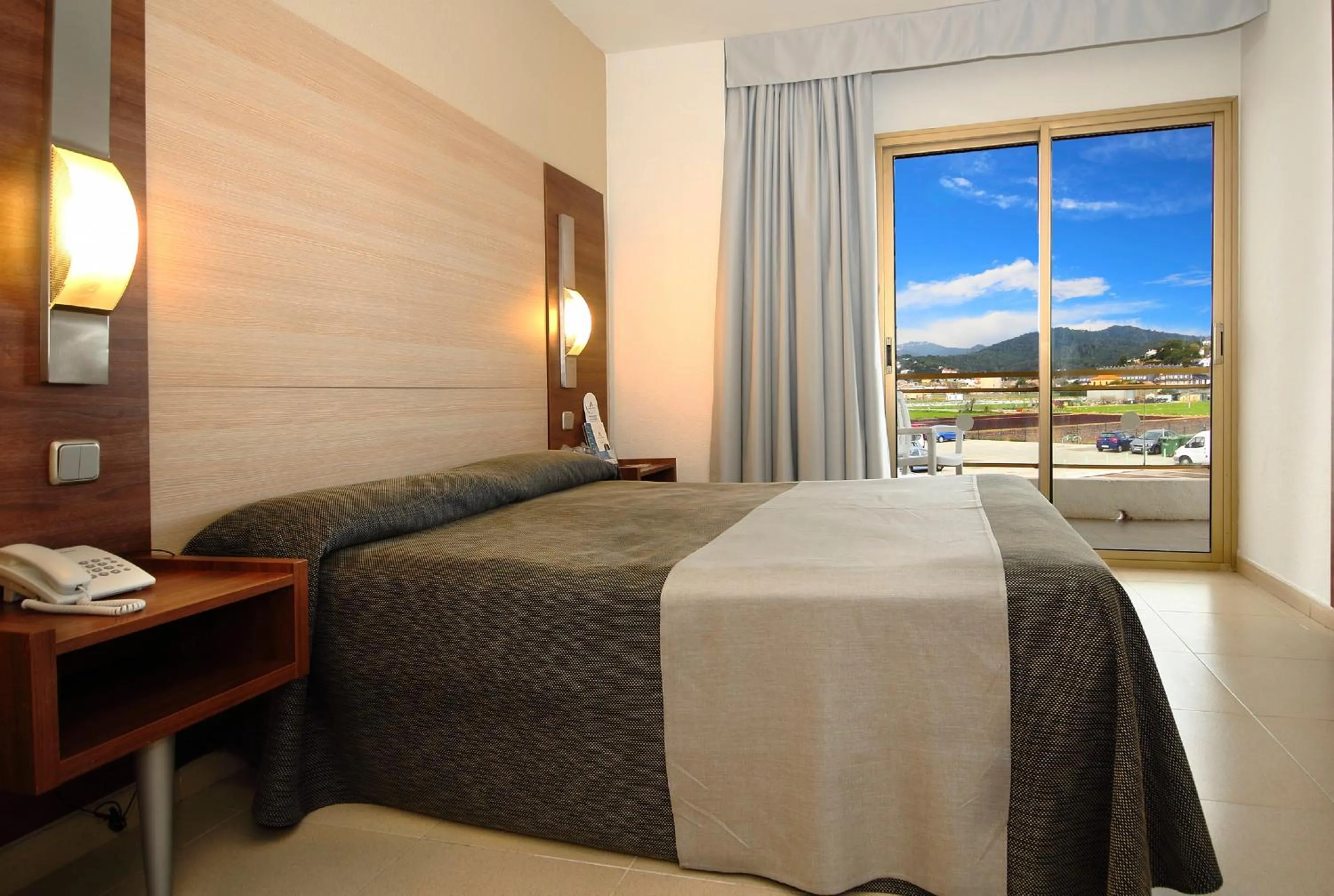 Bedroom, Bed in AQUA Hotel Aquamarina & Spa