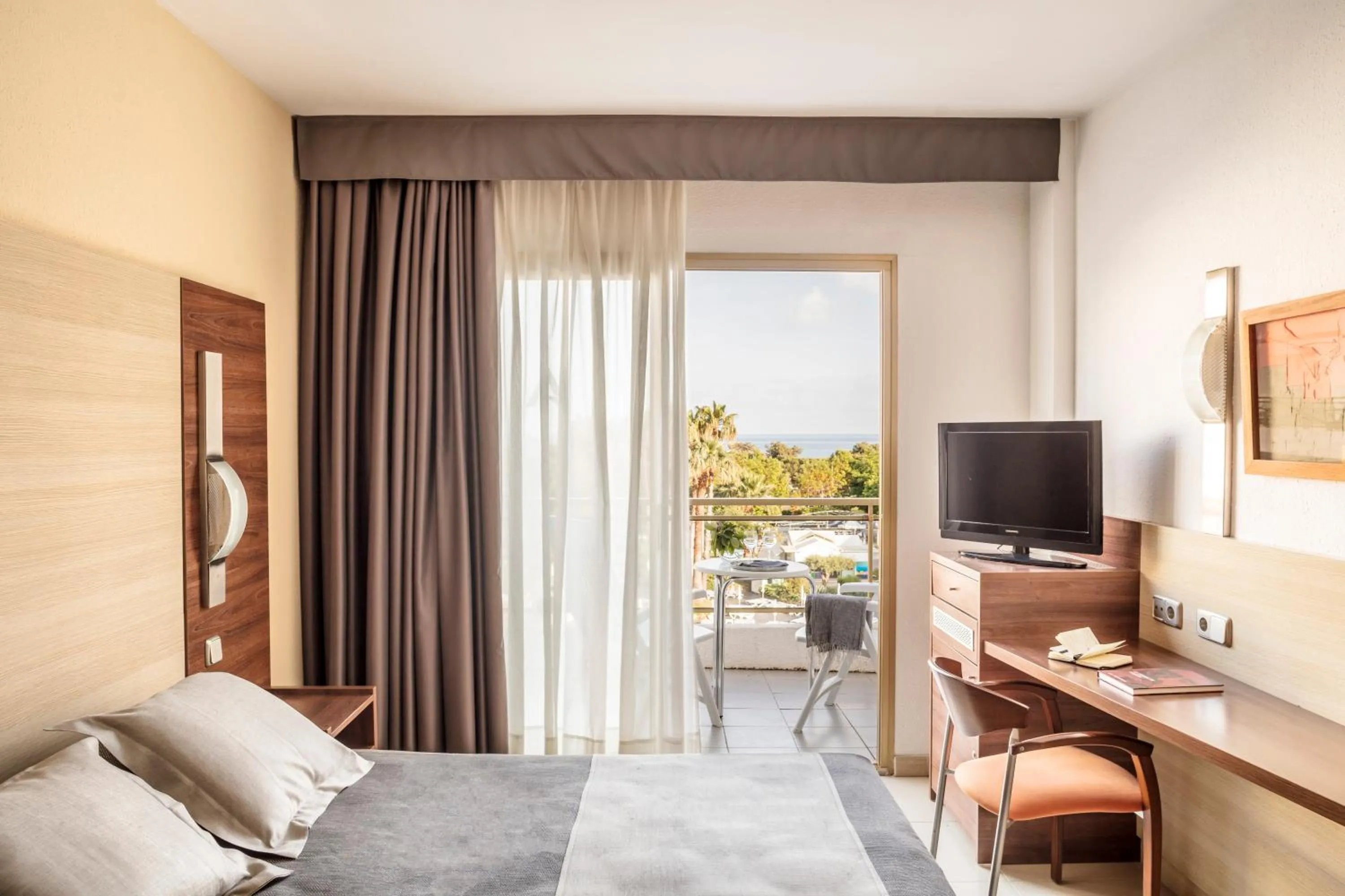 Photo of the whole room, Bed in AQUA Hotel Aquamarina & Spa