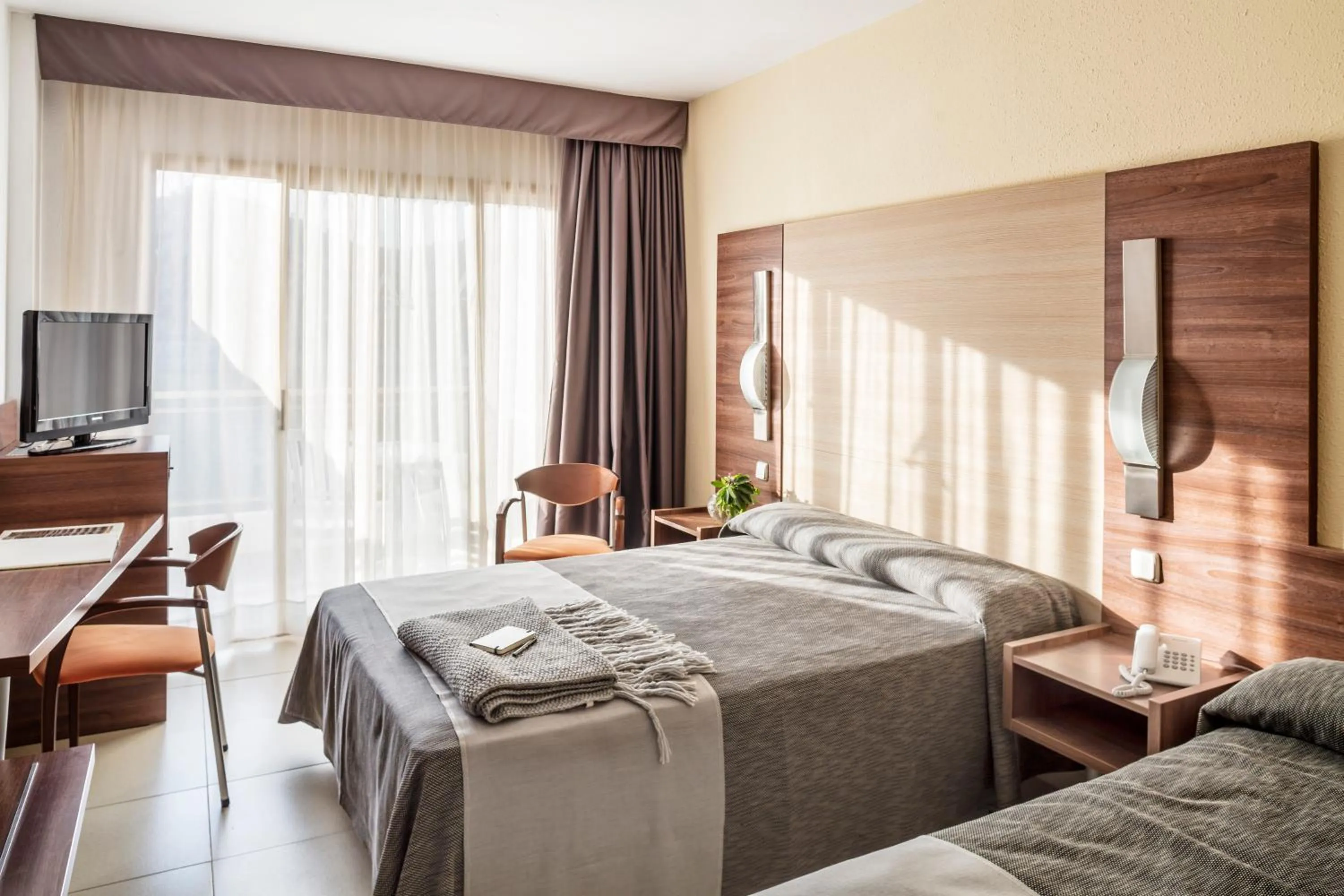 Photo of the whole room, Bed in AQUA Hotel Aquamarina & Spa