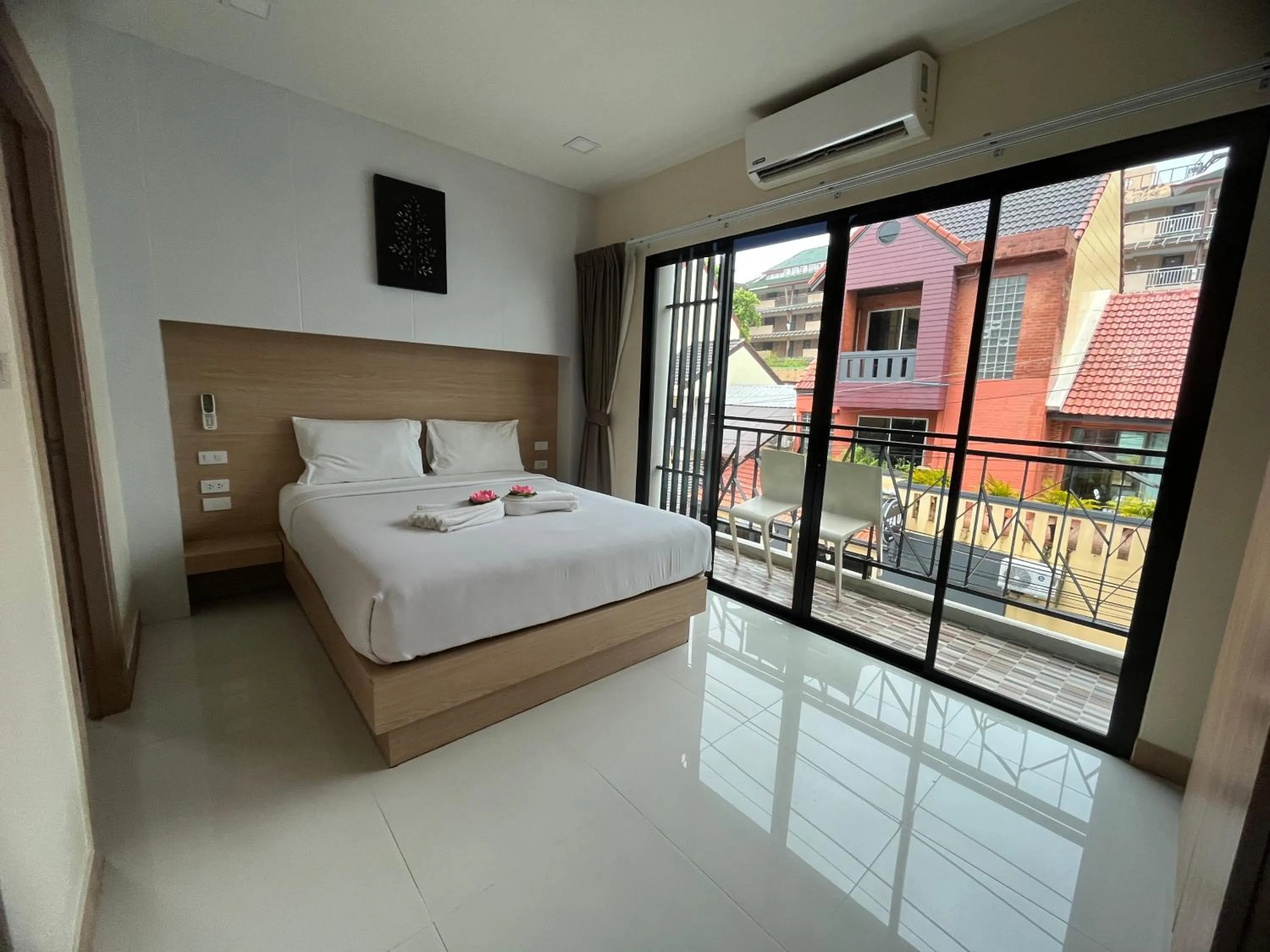 Bed in I AM O'TEL Patong