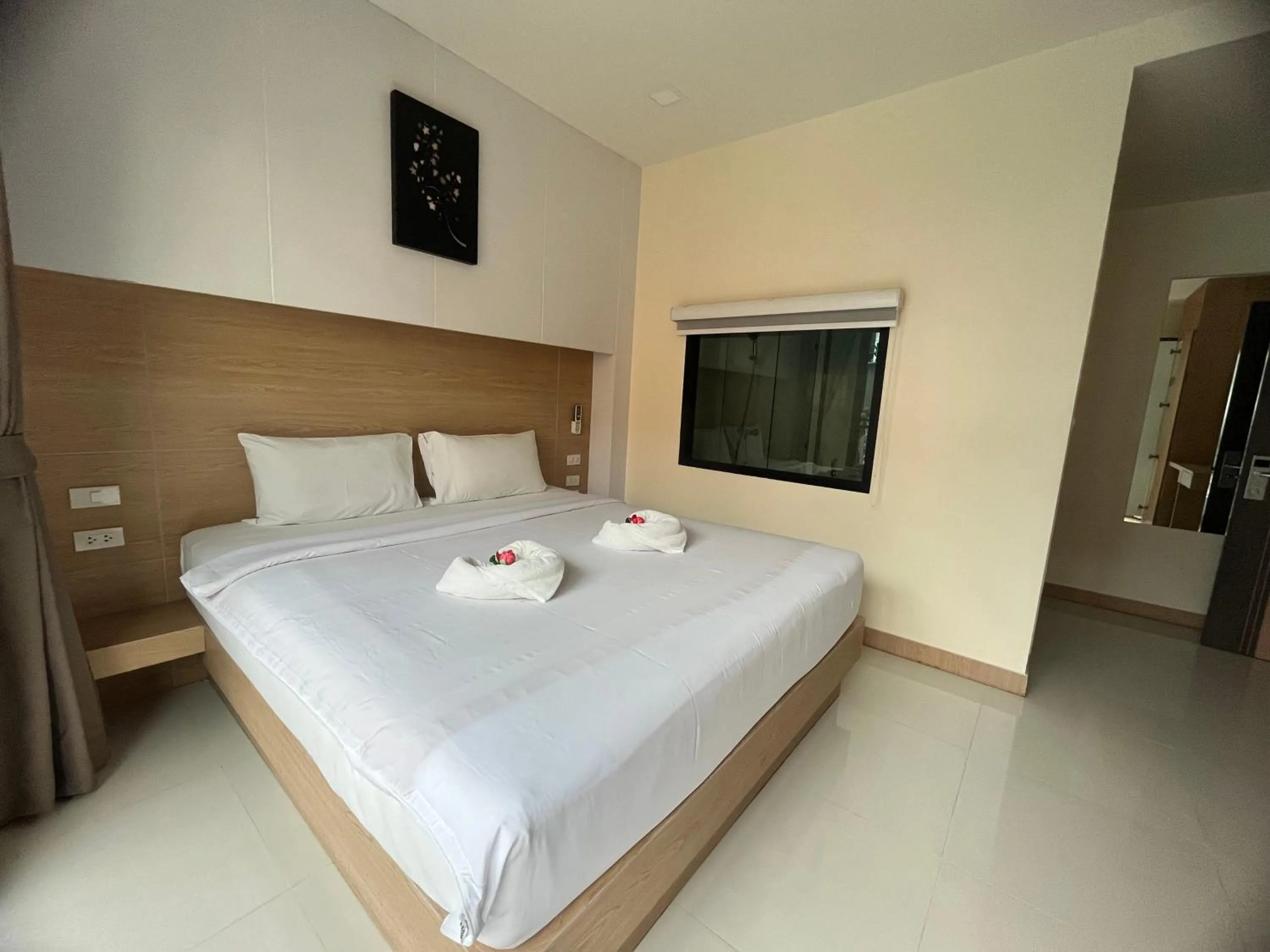 Bed in I AM O'TEL Patong