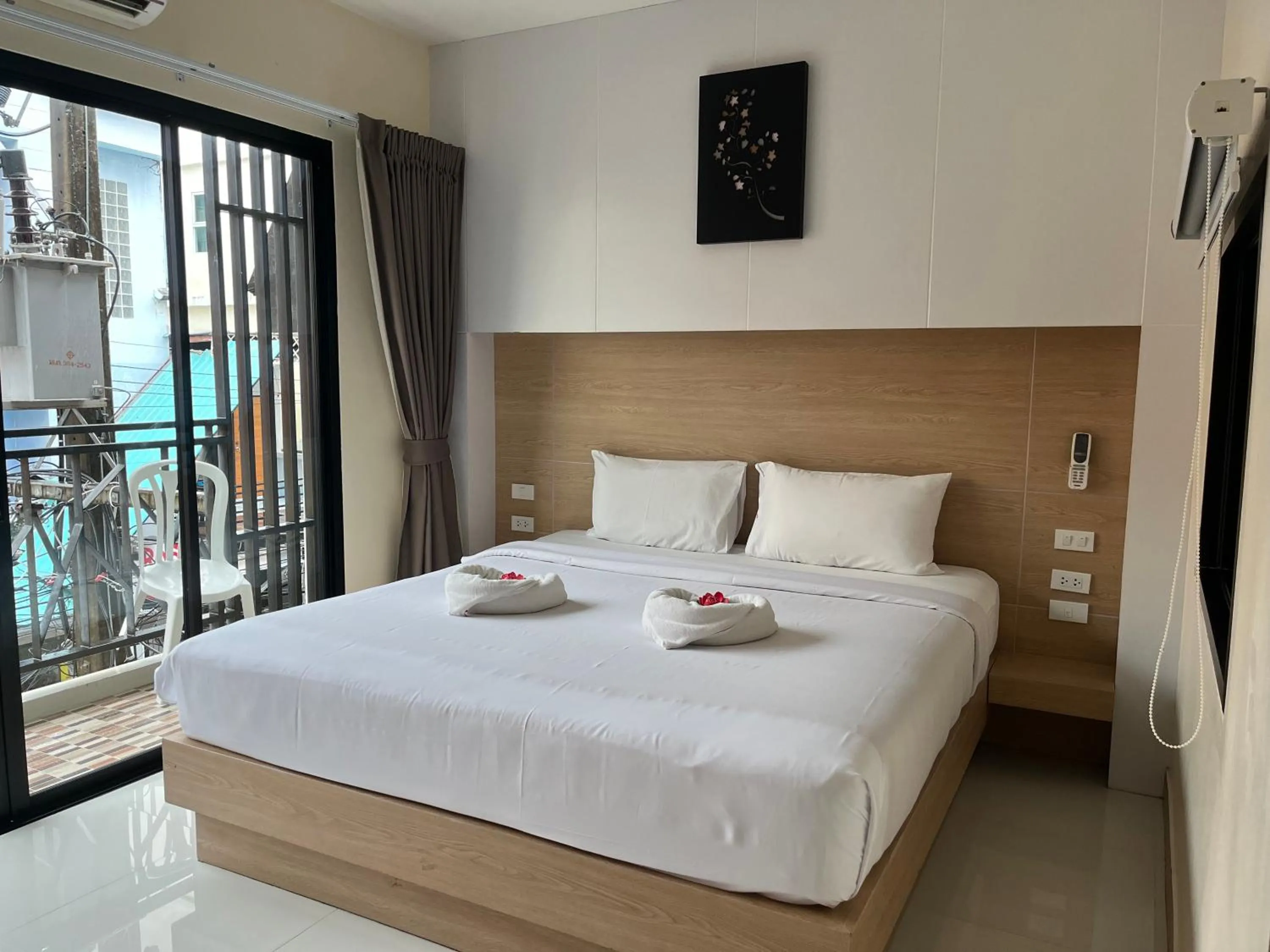 Bed in I AM O'TEL Patong
