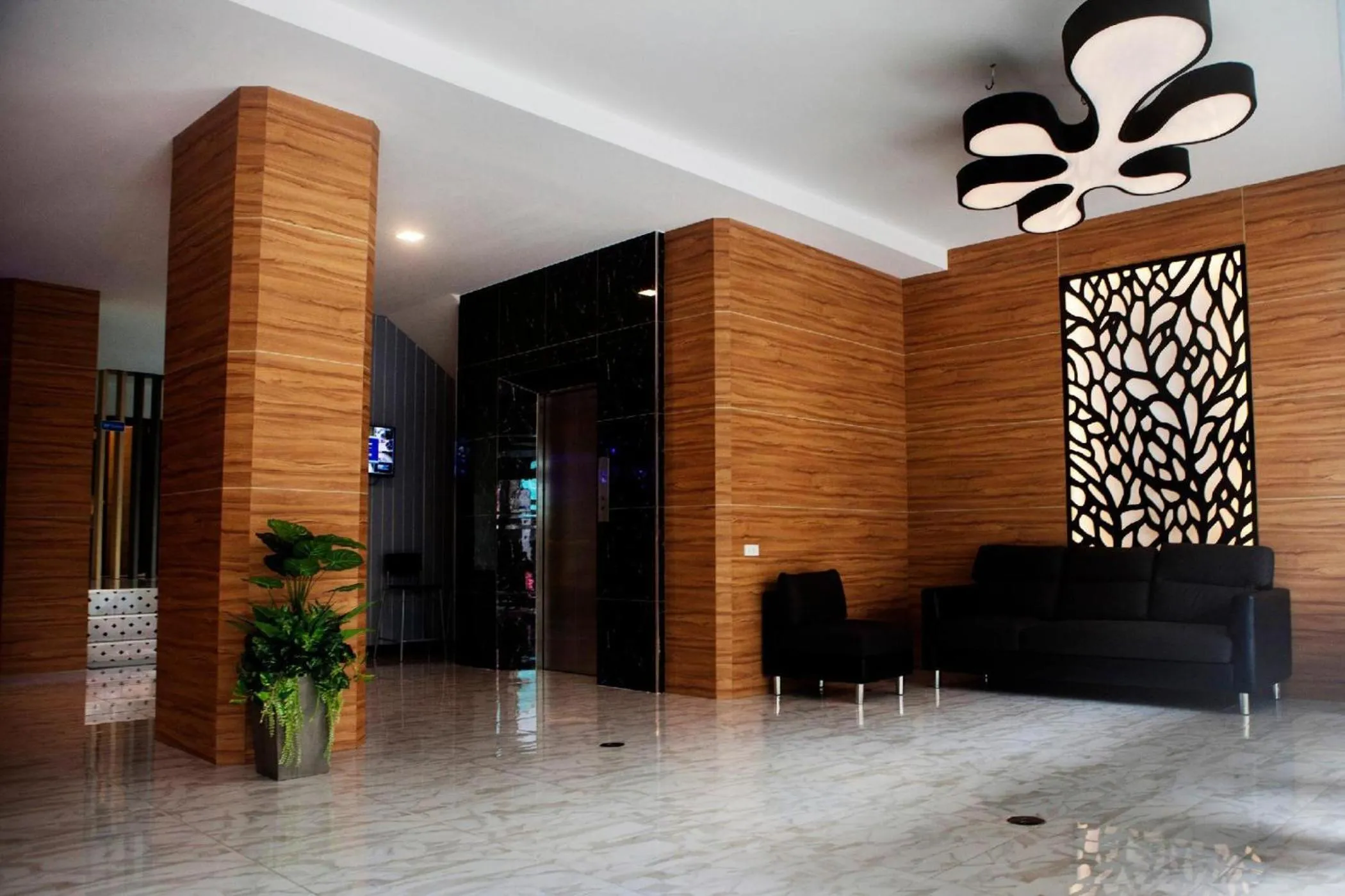 Living room in I AM O'TEL Patong