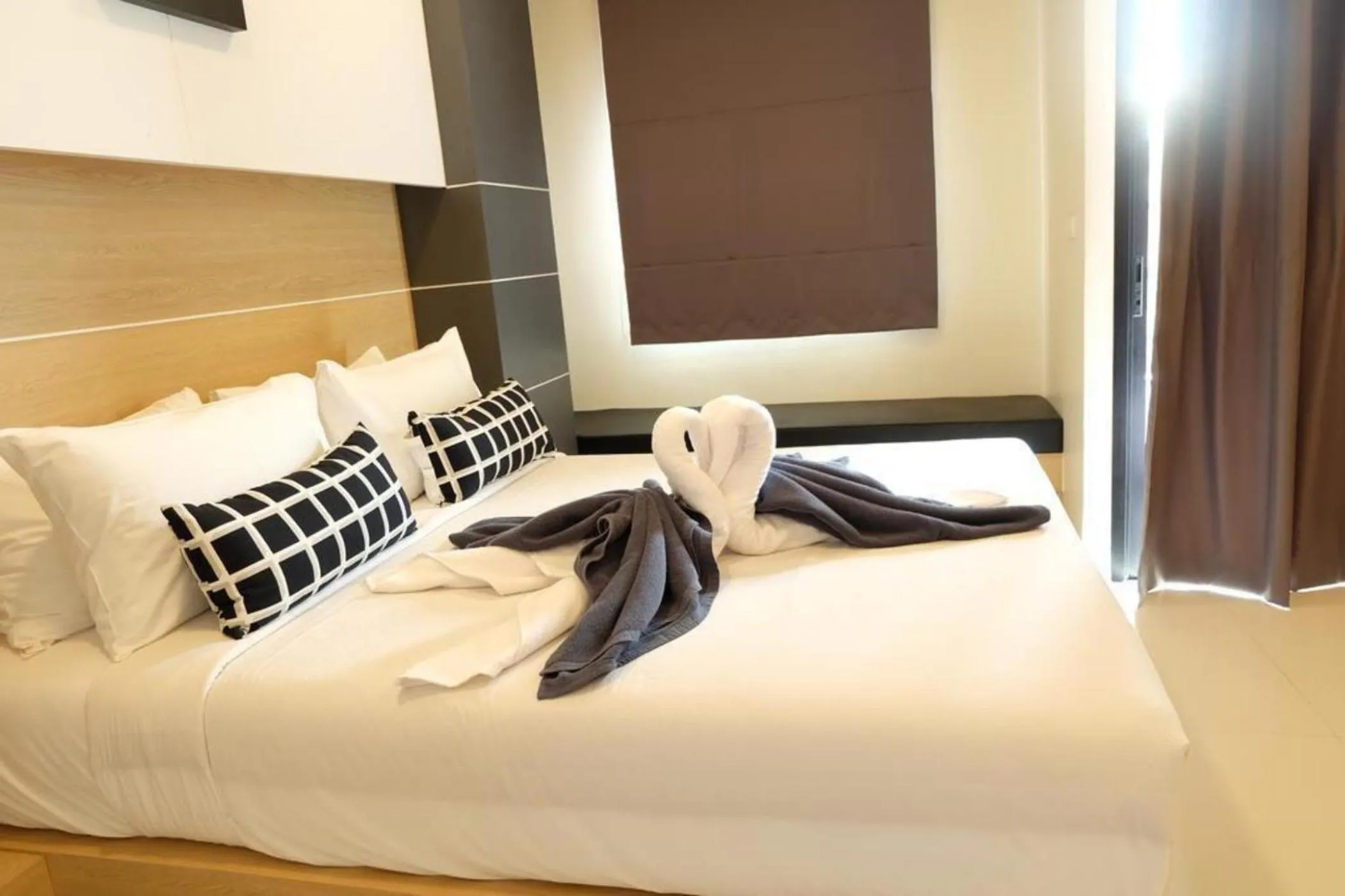 Bed in I AM O'TEL Patong