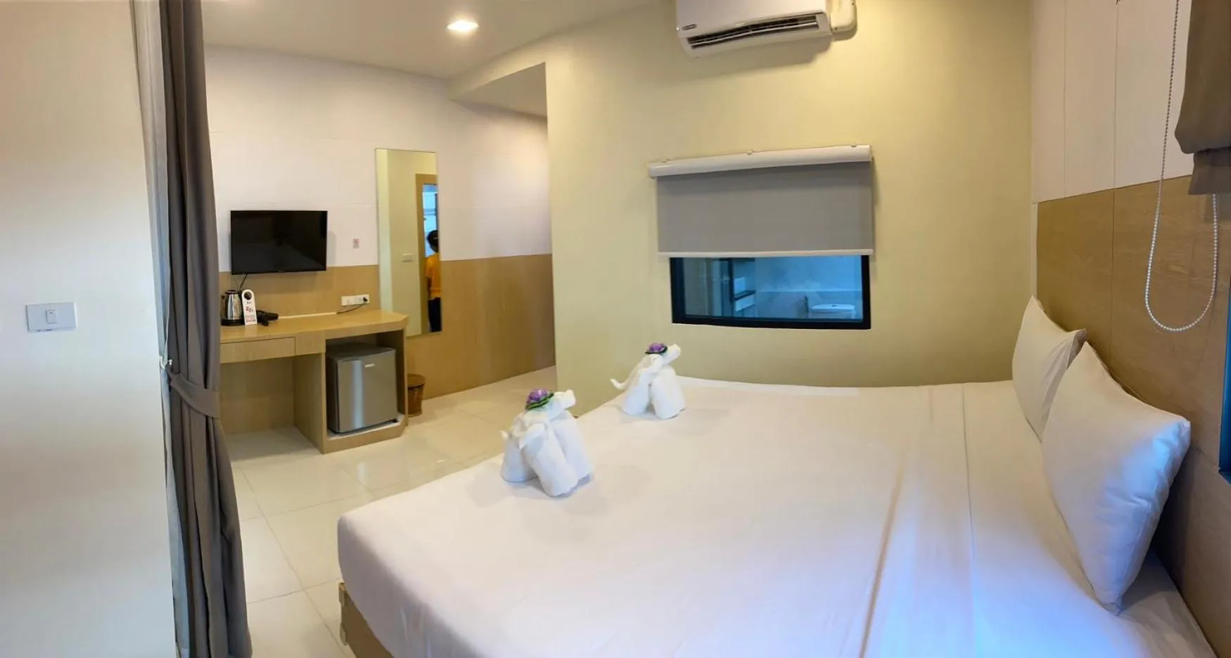 Bed in I AM O'TEL Patong