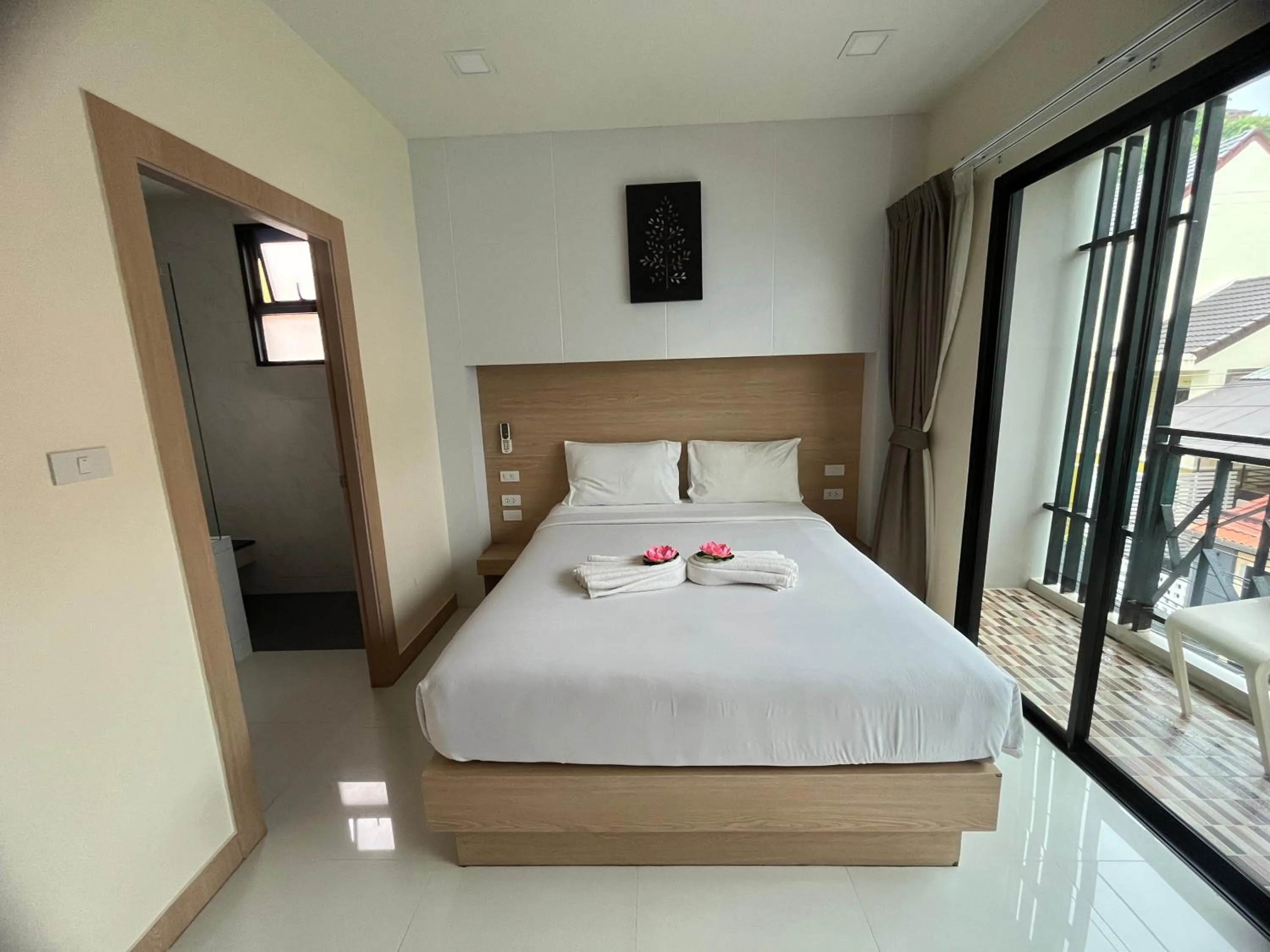 Bed in I AM O'TEL Patong