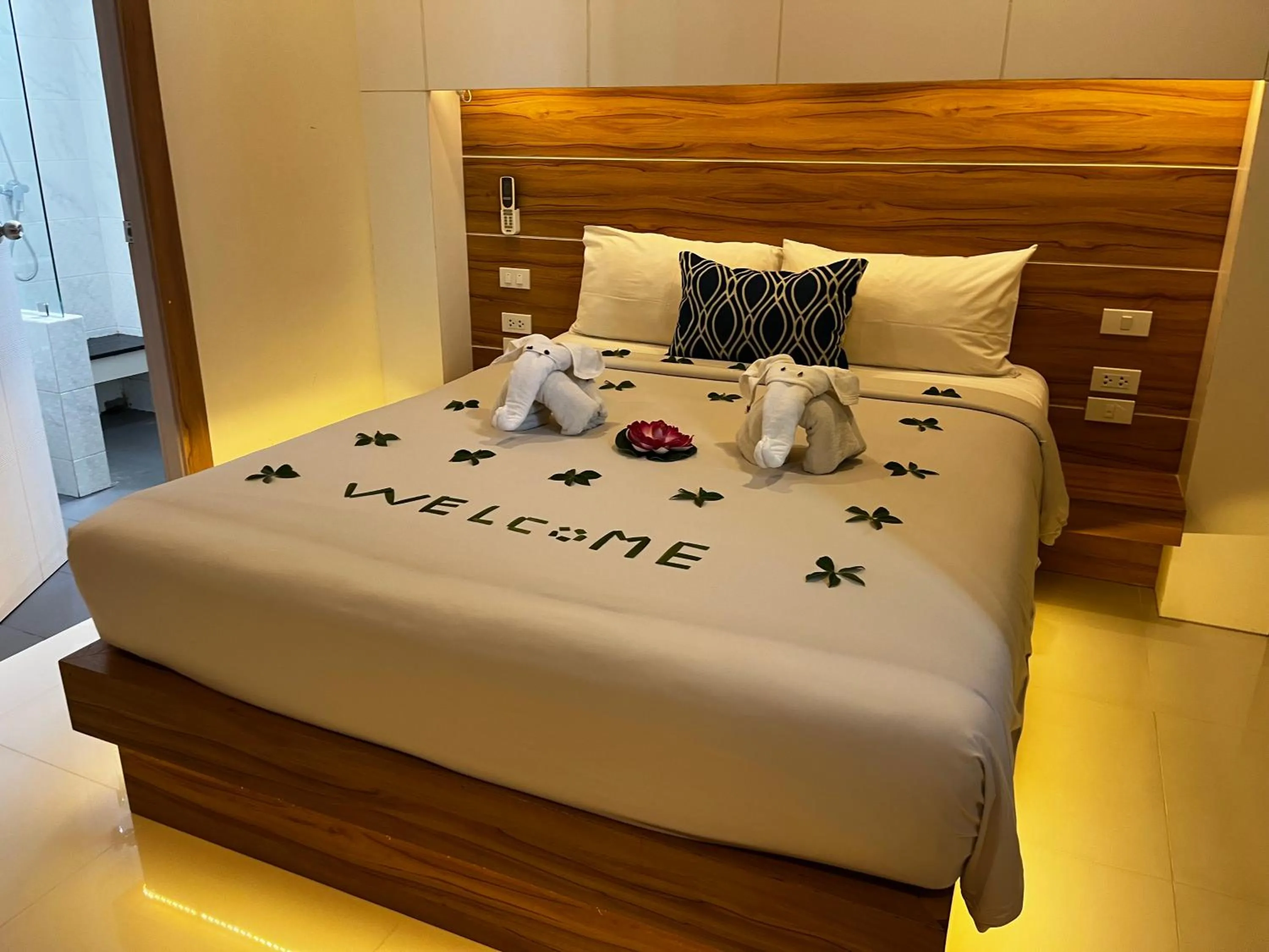 Bed in I AM O'TEL Patong