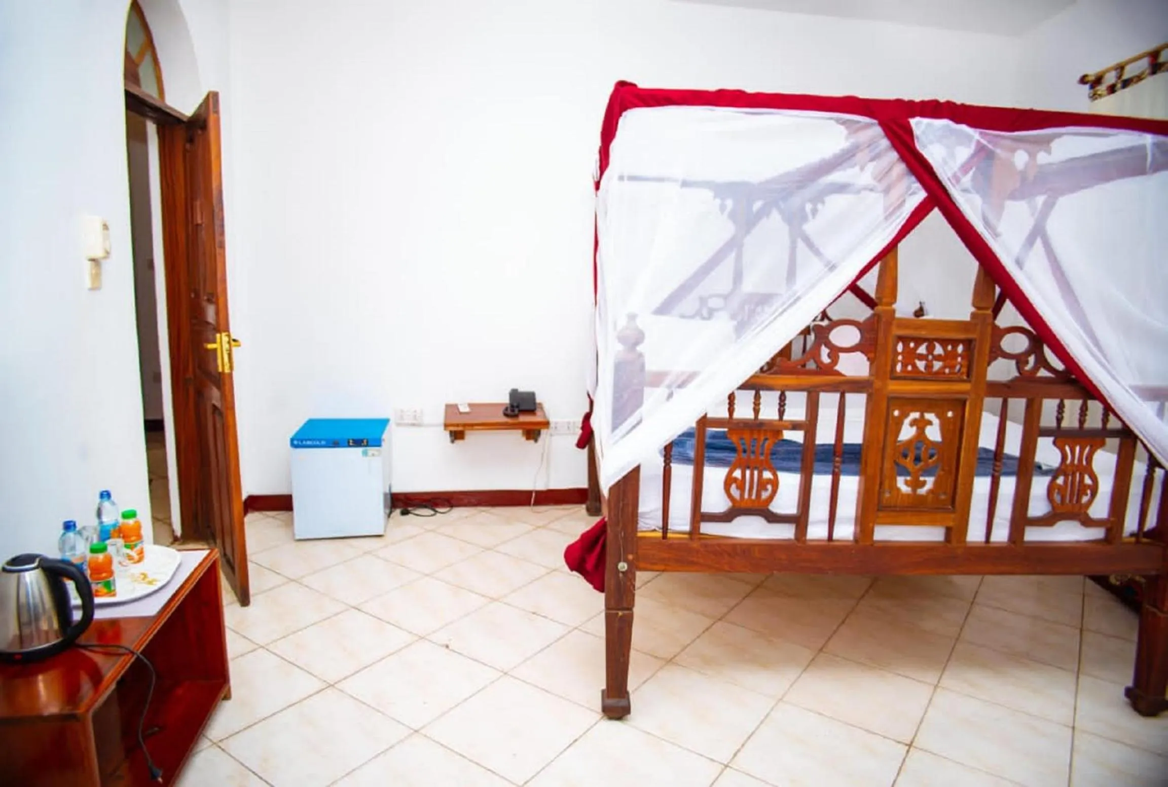 Bed in La Neisha Hotel Zanzibar