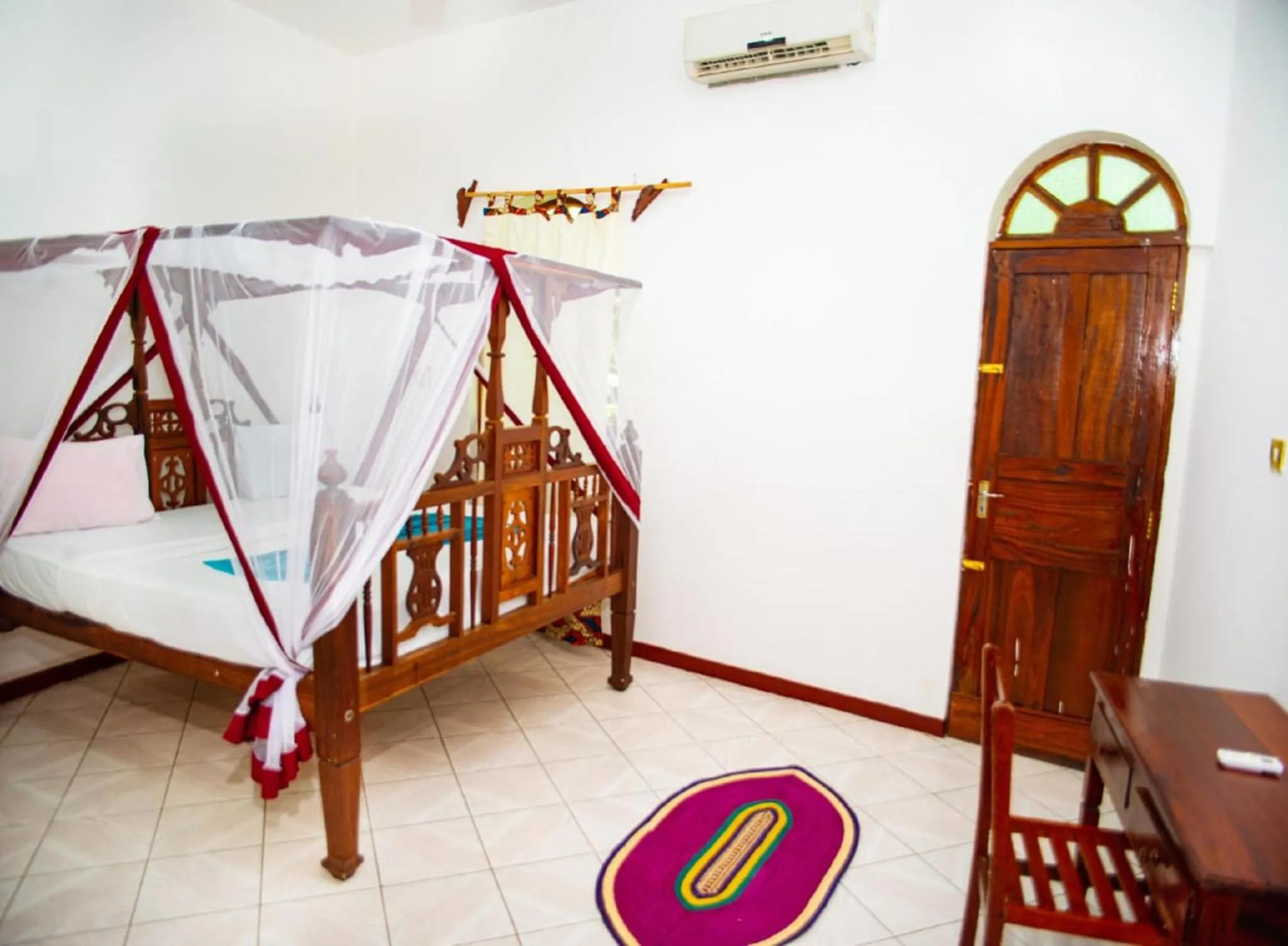 Bed in La Neisha Hotel Zanzibar