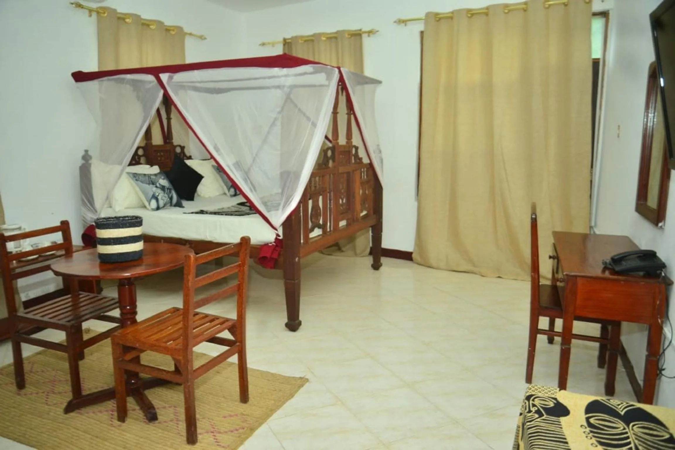 Bed in La Neisha Hotel Zanzibar