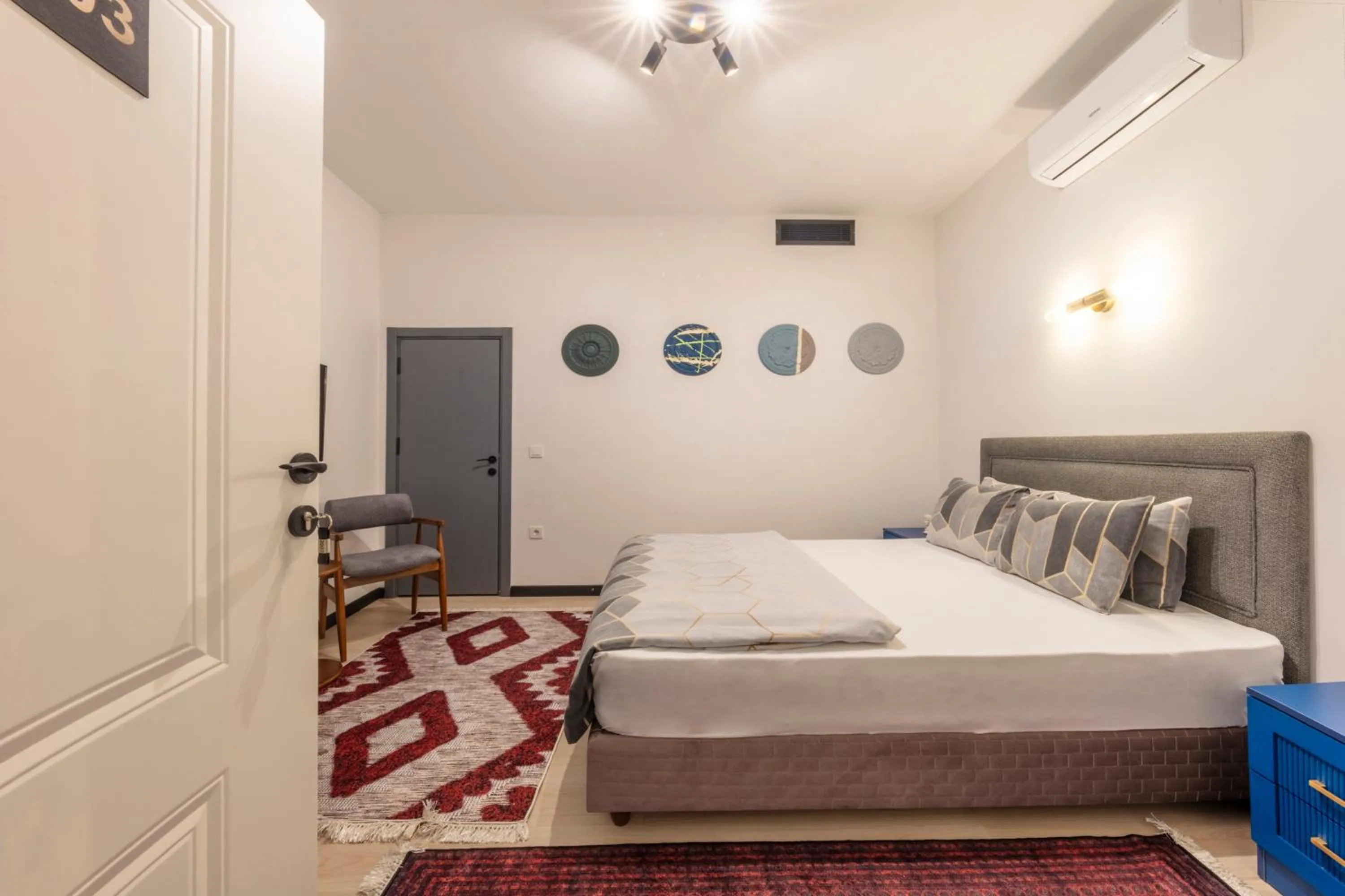 Bed in Hexa Suites Hotel