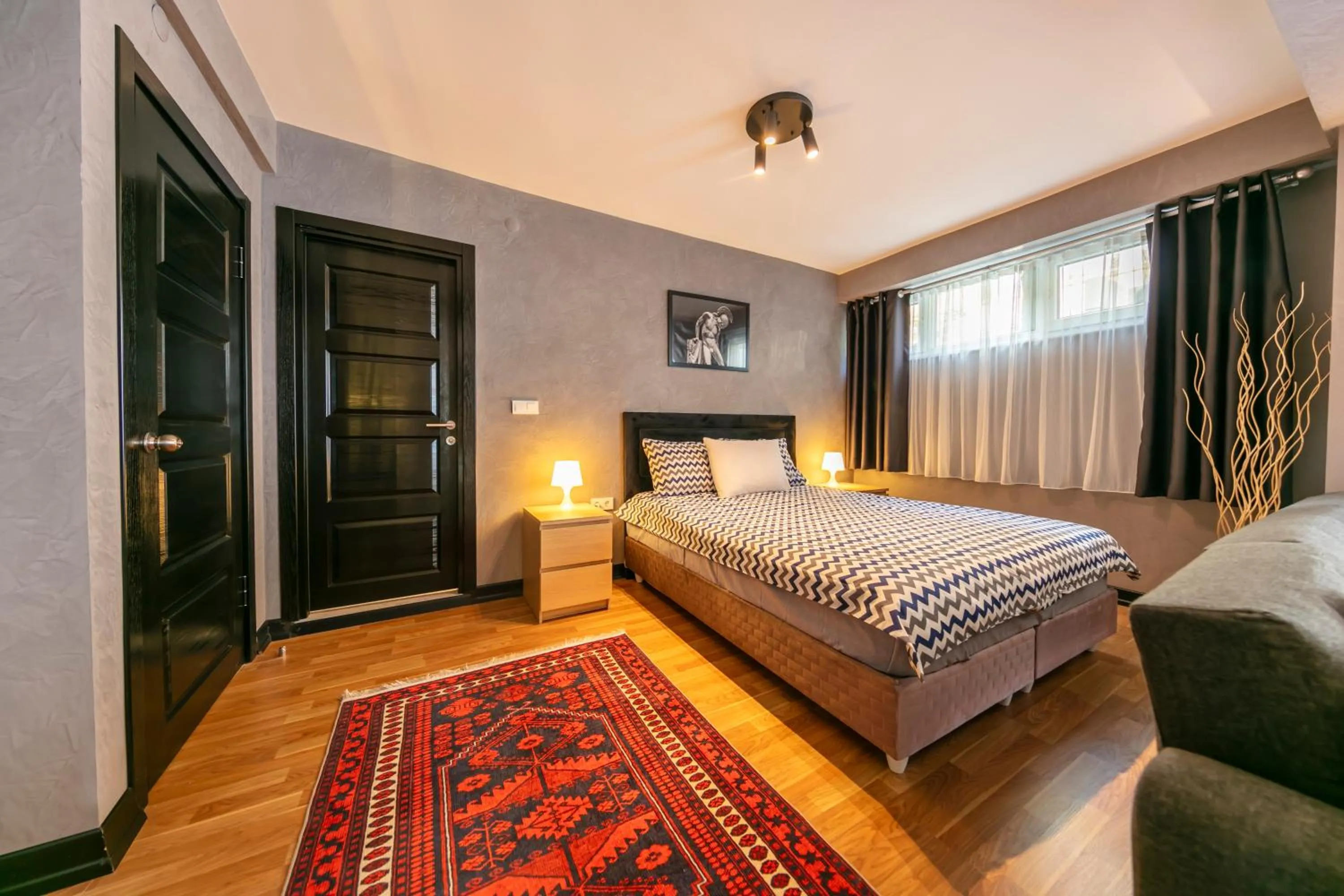 Bed in Hexa Suites Hotel