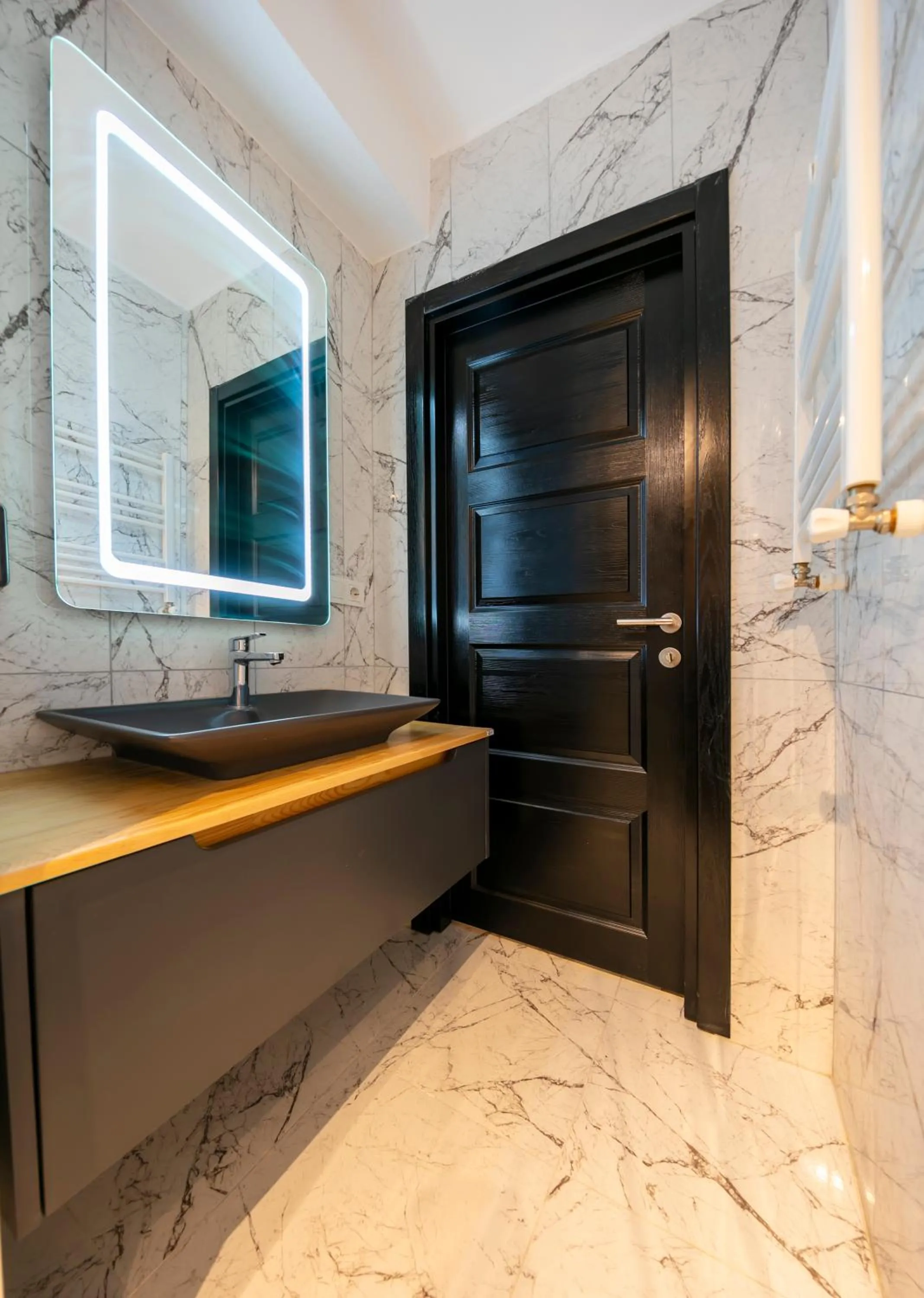 Bathroom in Hexa Suites Hotel