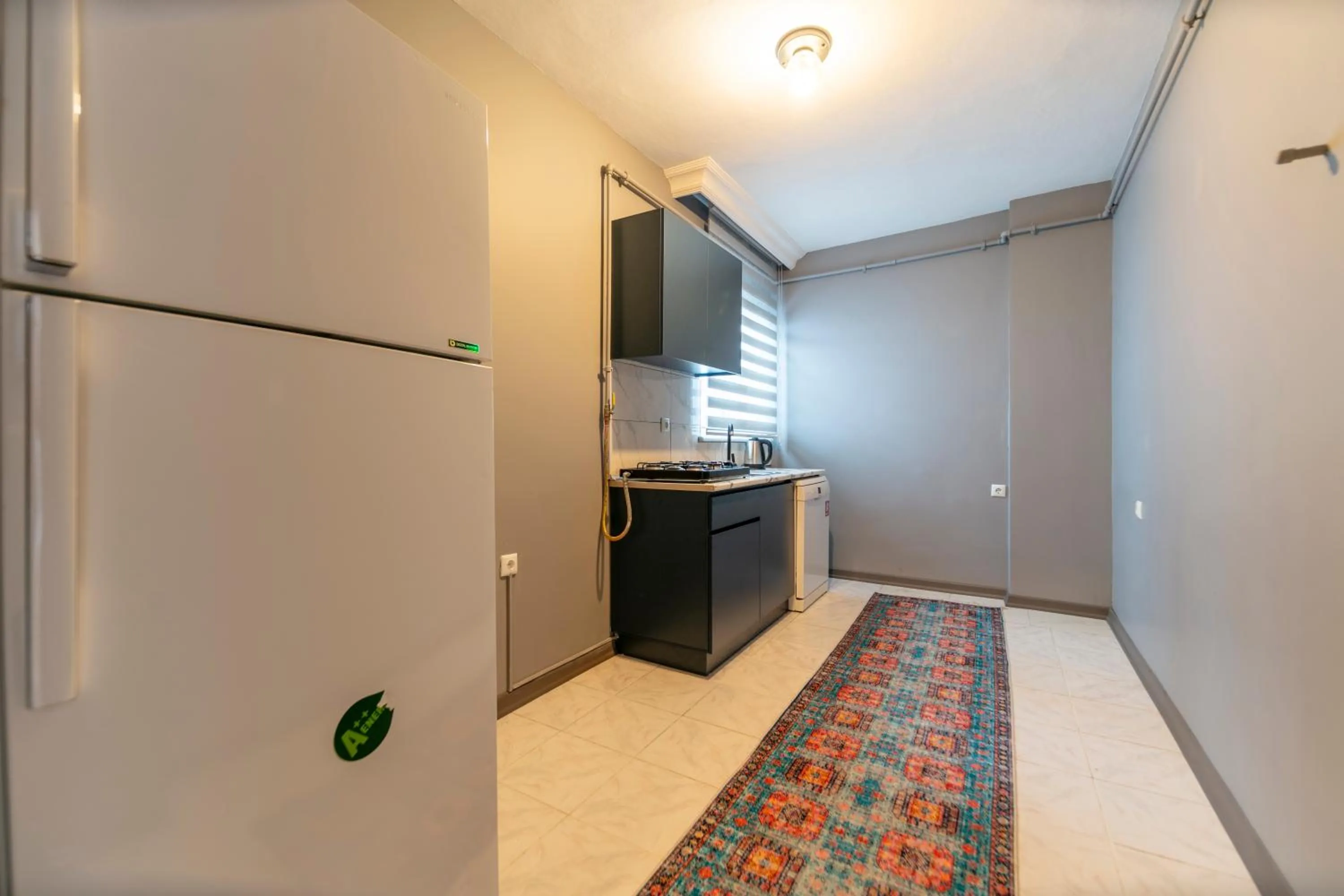 Kitchen or kitchenette in Hexa Suites Hotel