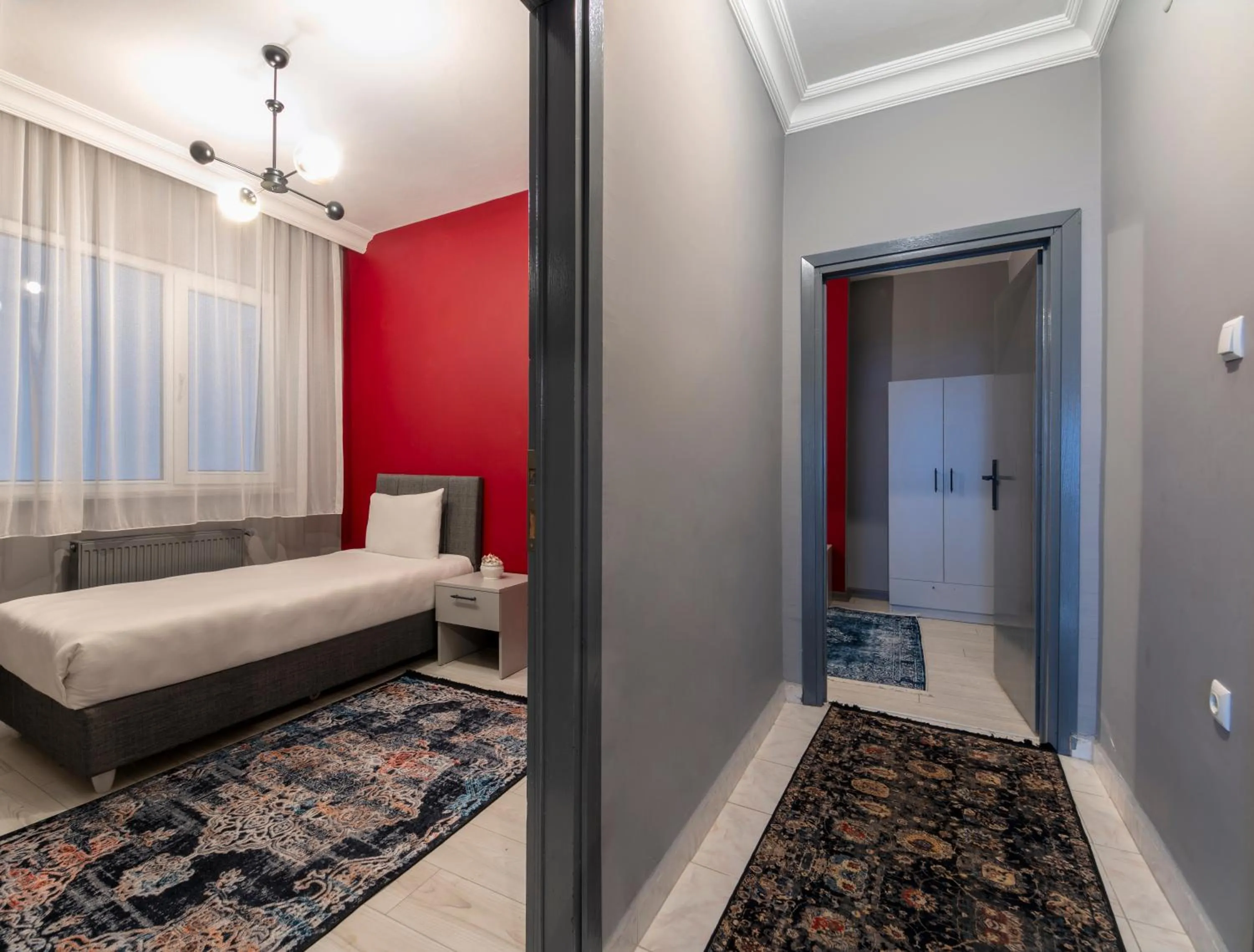 Bed in Hexa Suites Hotel