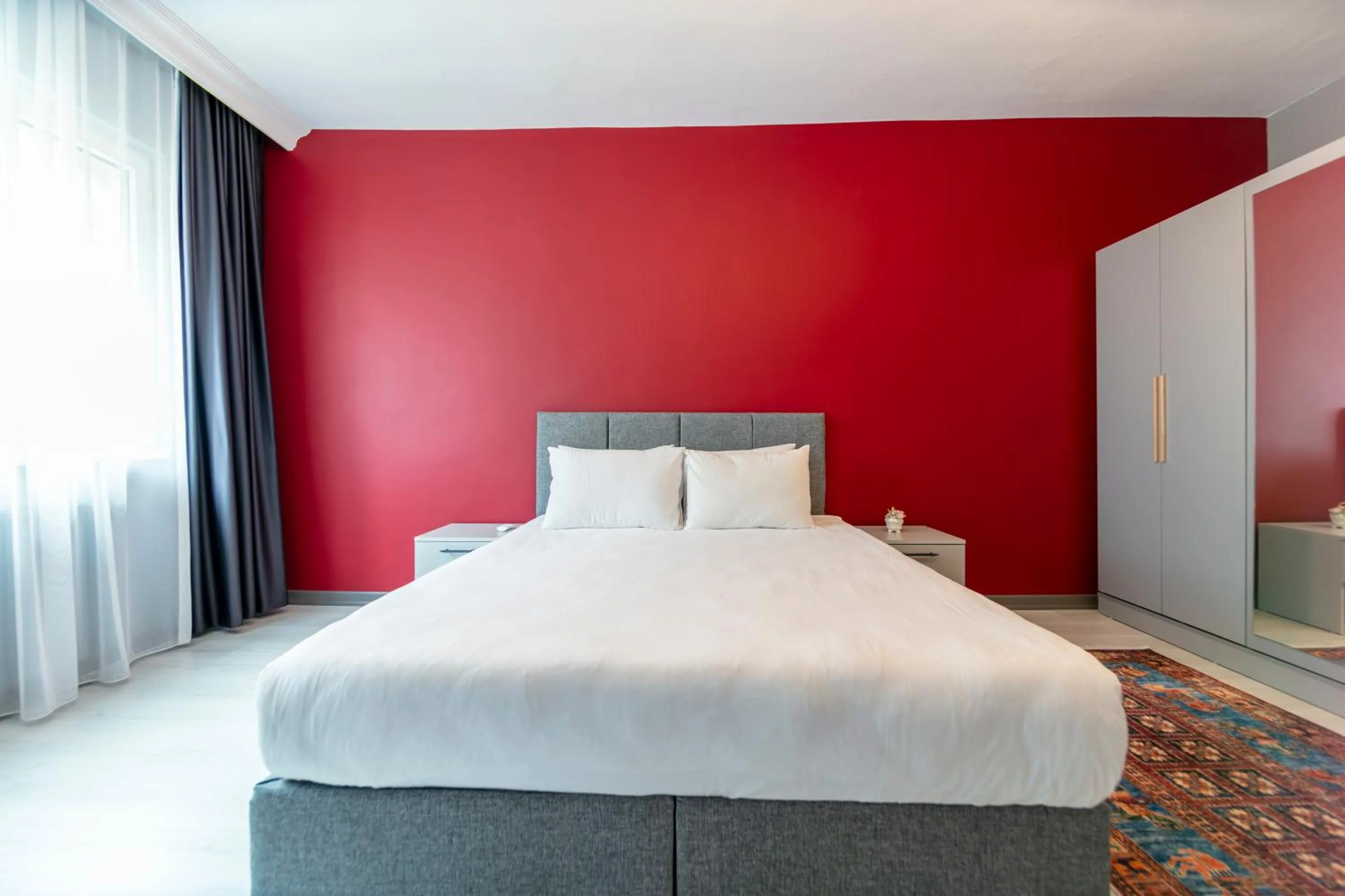 Bed in Hexa Suites Hotel