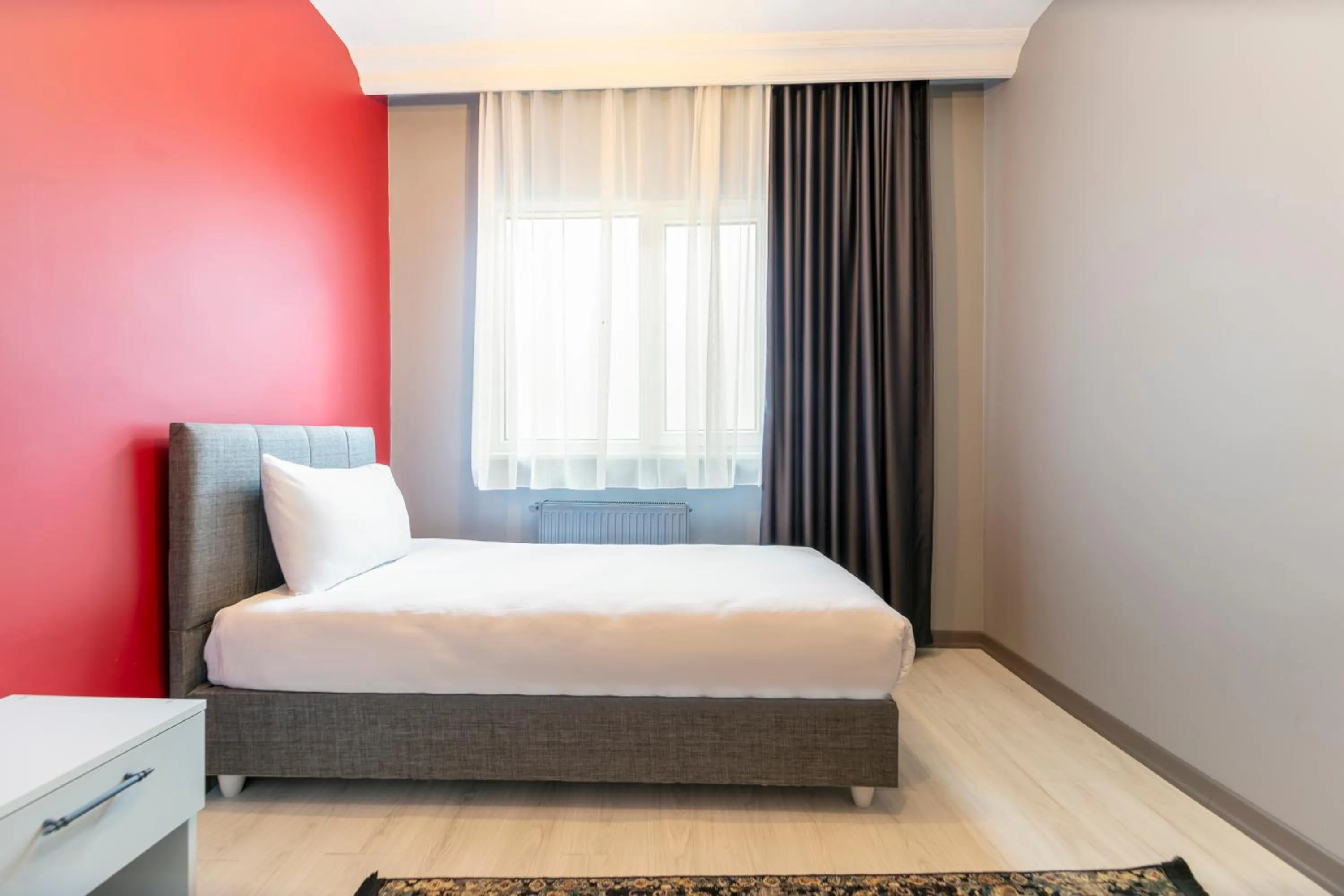 Bed in Hexa Suites Hotel