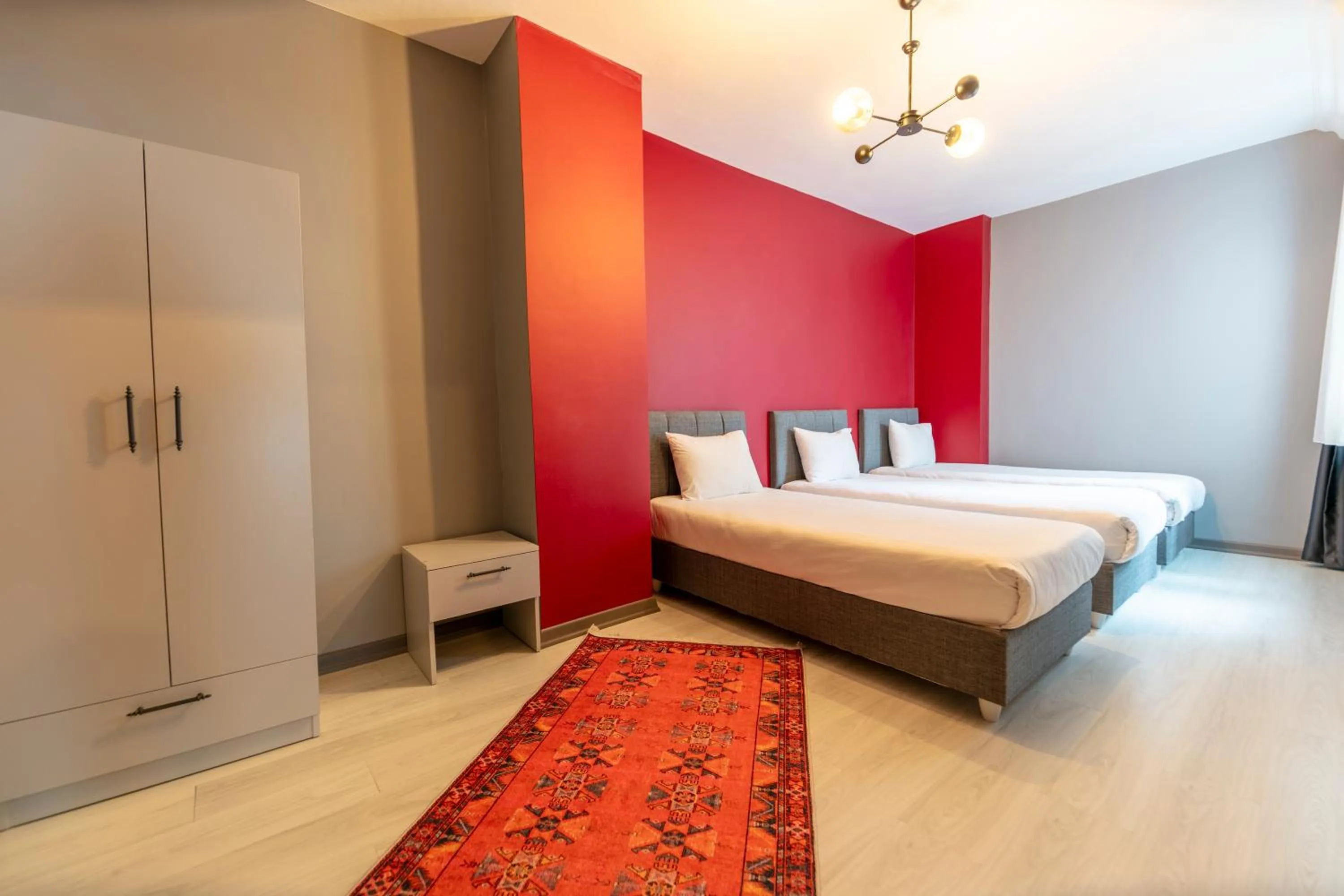 Bed in Hexa Suites Hotel