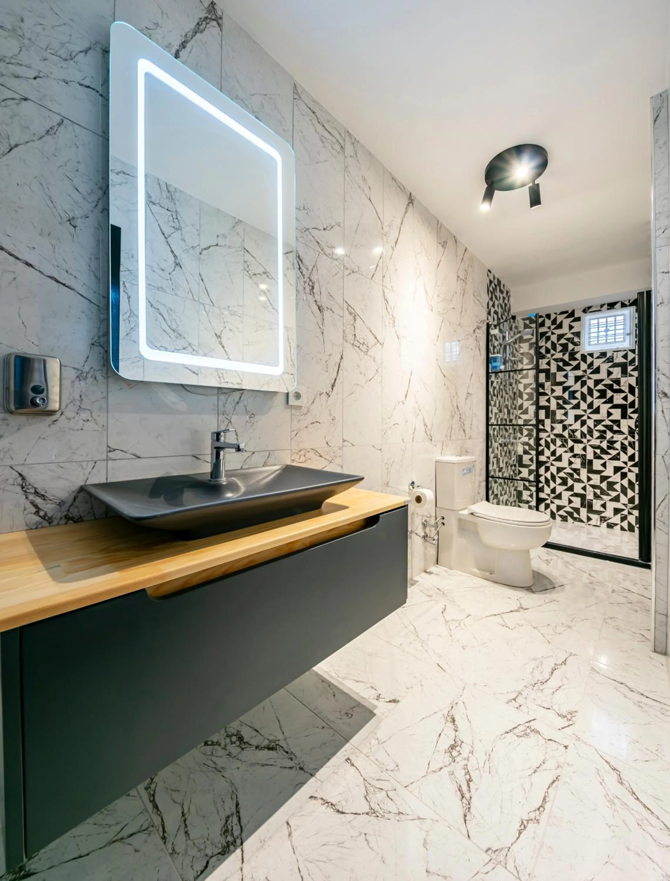 Toilet in Hexa Suites Hotel